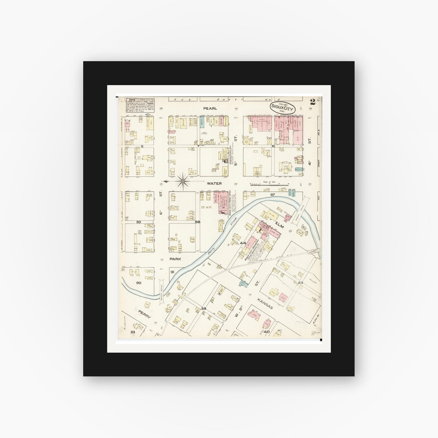 Old map wall art mockup — black gallery frame with white mat — Sanborn Fire Insurance Map from Sioux City, Woodbury County, Iowa (1884), Sheet #0002