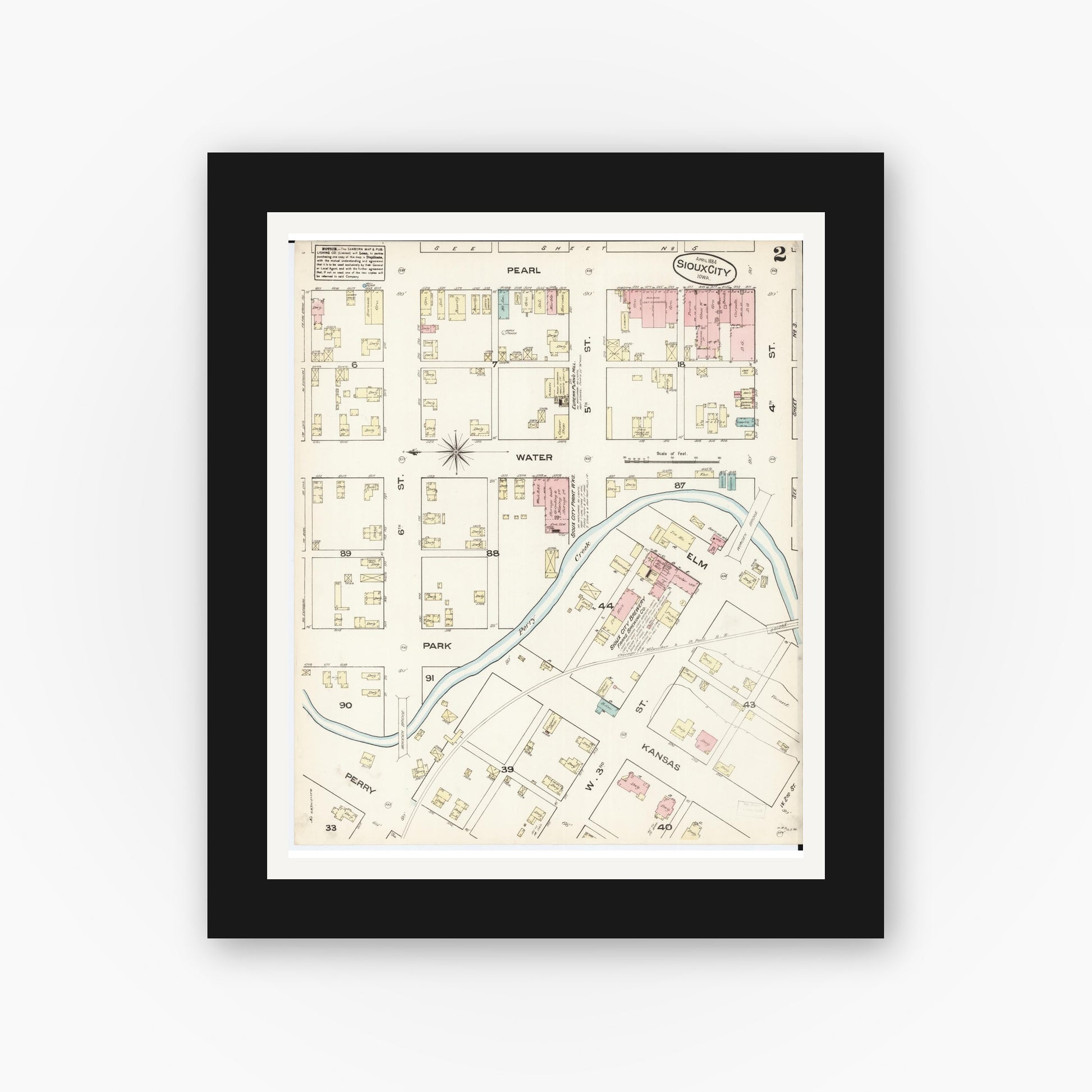 Old map wall art mockup — black gallery frame with white mat — Sanborn Fire Insurance Map from Sioux City, Woodbury County, Iowa (1884), Sheet #0002