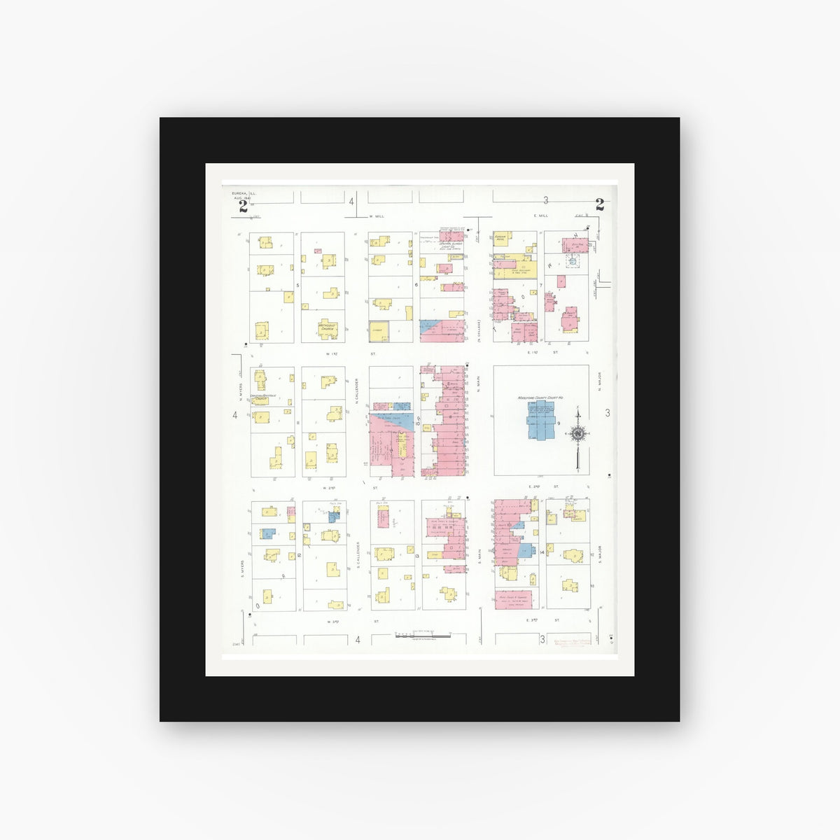 Old map wall art mockup — black gallery frame with white mat — Sanborn Fire Insurance Map from Eureka, Woodford County, Illinois (1941), Sheet #0002