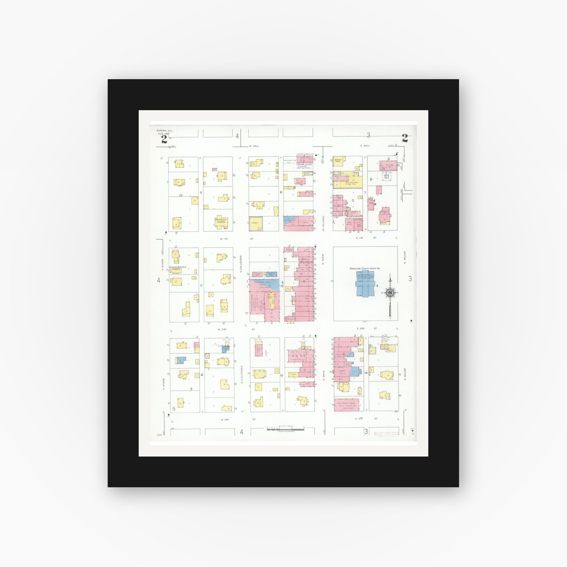 Old map wall art mockup — black gallery frame with white mat — Sanborn Fire Insurance Map from Eureka, Woodford County, Illinois (1941), Sheet #0002