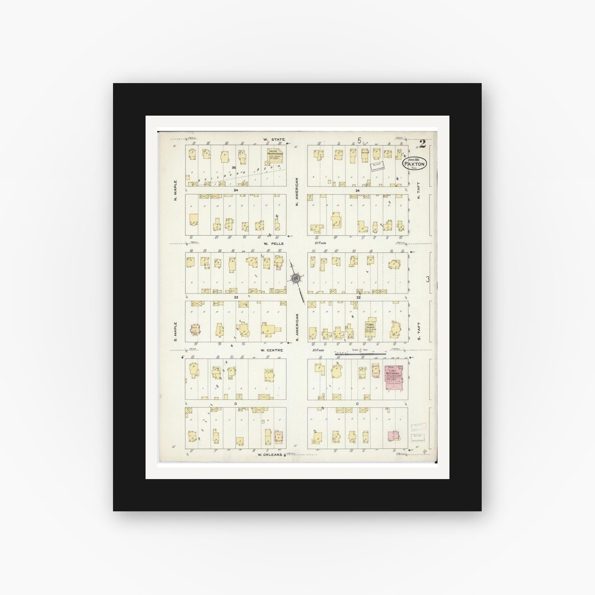 Old map wall art mockup — black gallery frame with white mat — Sanborn Fire Insurance Map from Paxton, Ford County, Illinois (1910), Sheet #0002