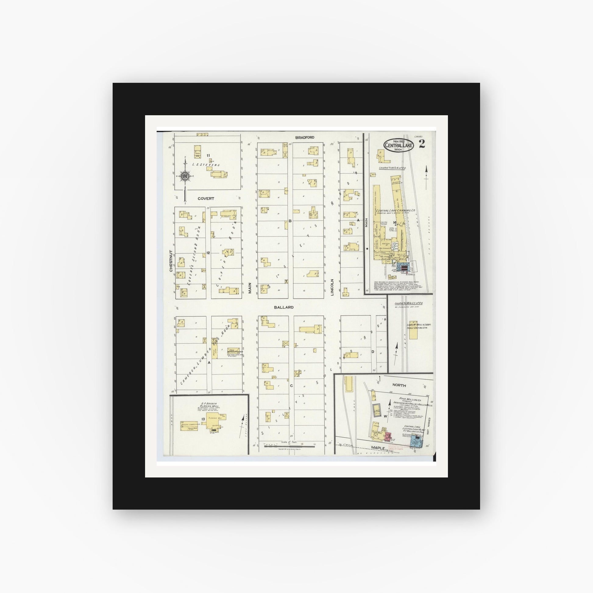 Old map wall art mockup — black gallery frame with white mat — Sanborn Fire Insurance Map from Central Lake, Antrim County, Michigan (1920), Sheet #0002