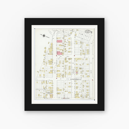 Old map wall art mockup — black gallery frame with white mat — Sanborn Fire Insurance Map from Caspian, Iron County, Michigan (1922), Sheet #0002