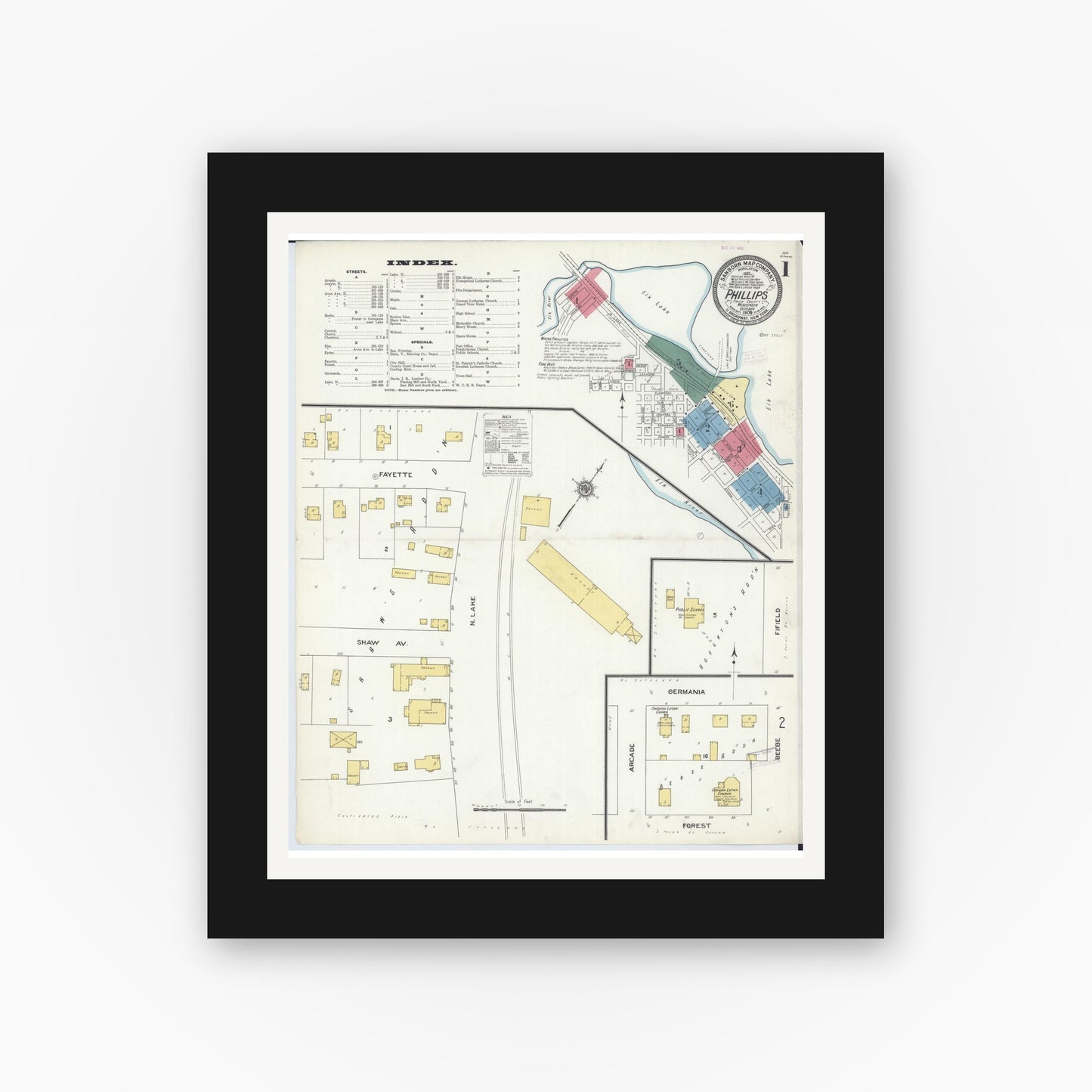 Old map wall art mockup — black gallery frame with white mat — Sanborn Fire Insurance Map from Phillips, Price County, Wisconsin (1909), Sheet #0001