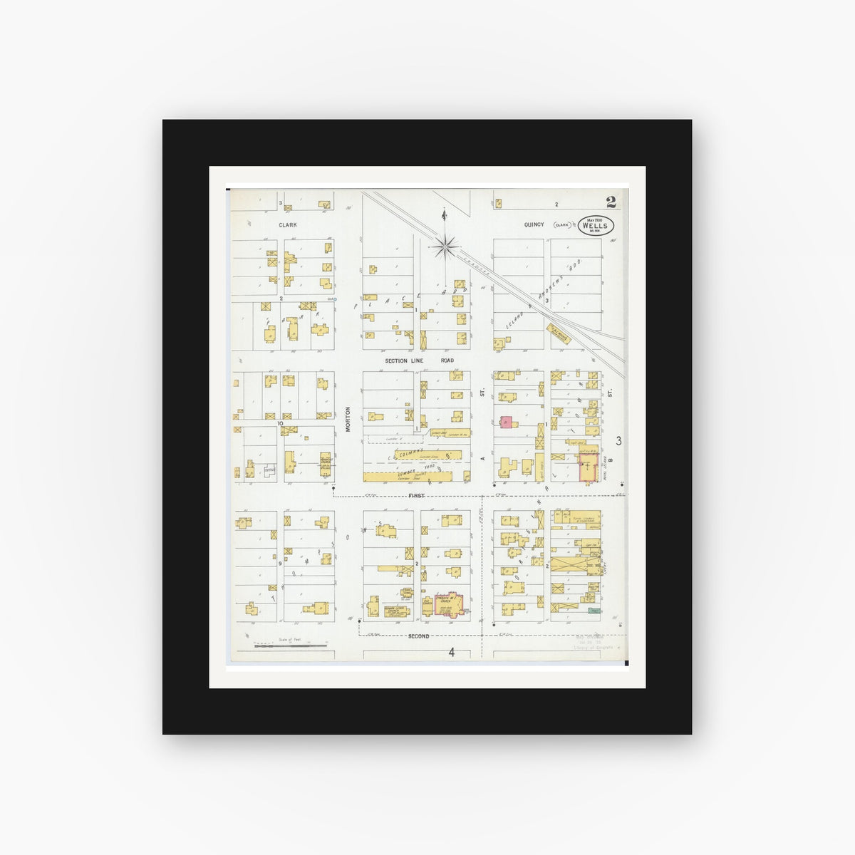 Old map wall art mockup — black gallery frame with white mat — Sanborn Fire Insurance Map from Wells, Faribault County, Minnesota (1900), Sheet #0002