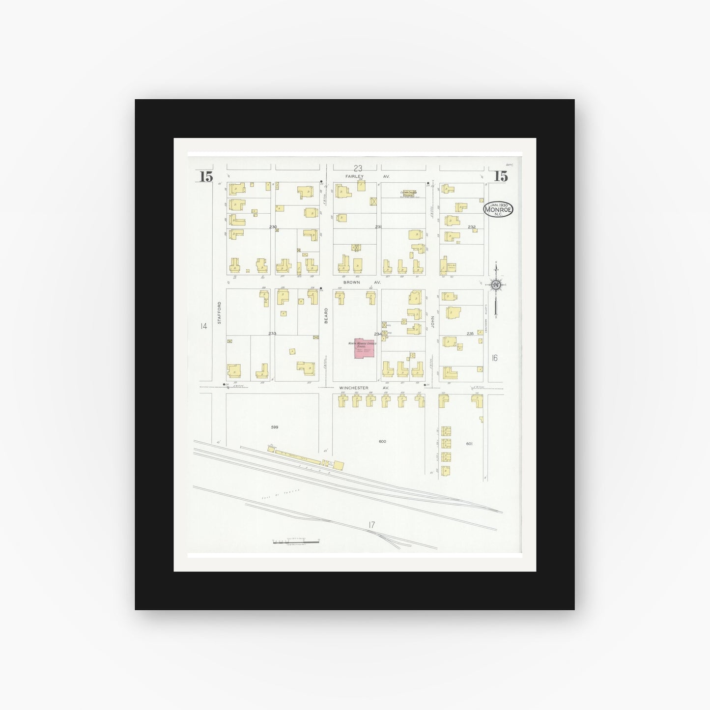 Old map wall art mockup — black gallery frame with white mat — Sanborn Fire Insurance Map from Monroe, Union County, North Carolina (1930), Sheet #0015