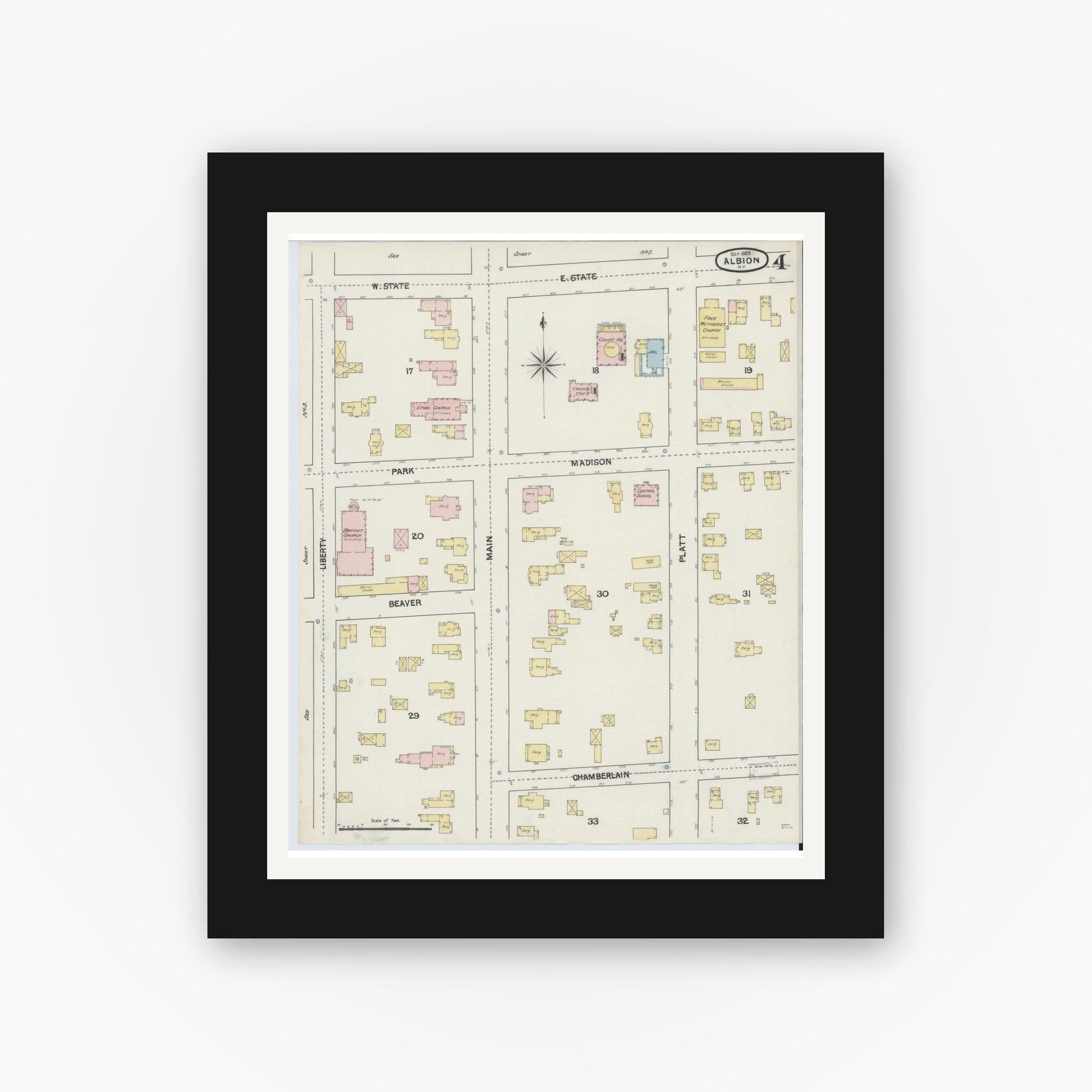 Old map wall art mockup — black gallery frame with white mat — Sanborn Fire Insurance Map from Albion, Orleans County, New York (1889), Sheet #0004