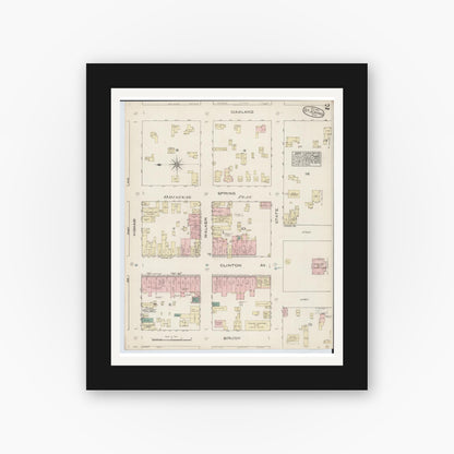 Old map wall art mockup — black gallery frame with white mat — Sanborn Fire Insurance Map from Saint Johns, Clinton County, Michigan (1884), Sheet #0002