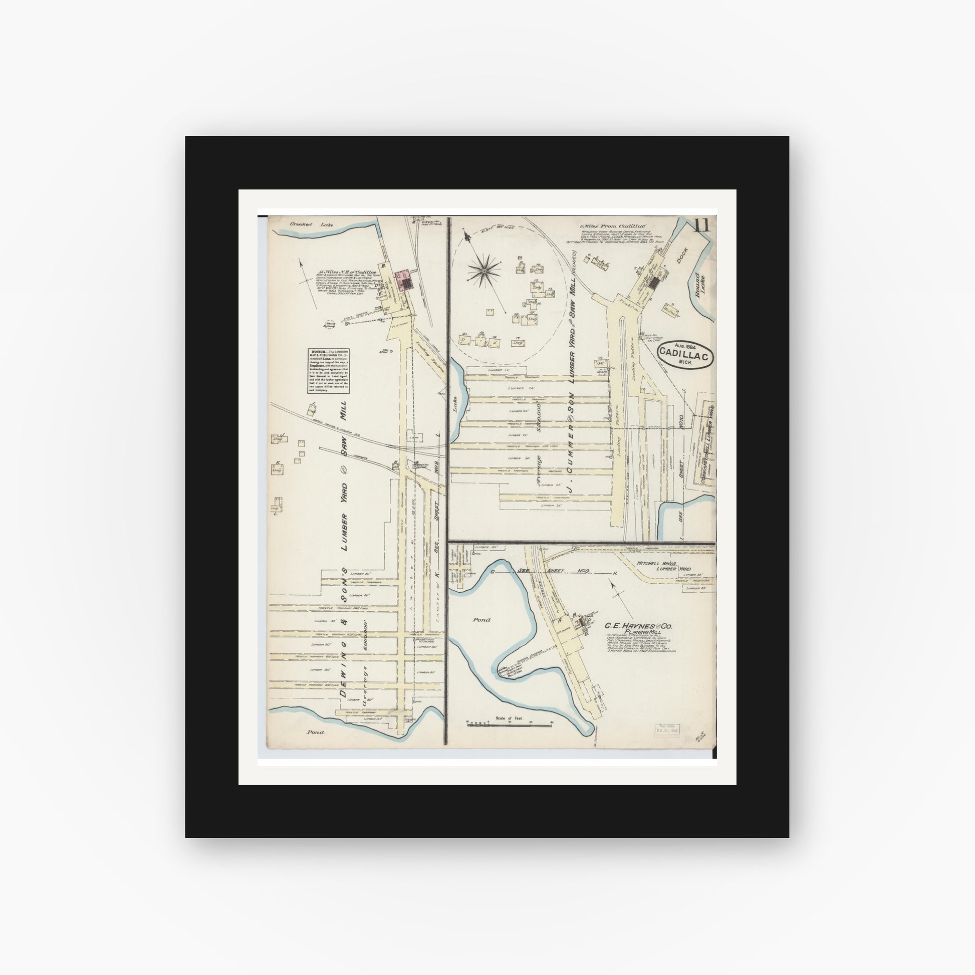 Old map wall art mockup — black gallery frame with white mat — Sanborn Fire Insurance Map from Cadillac, Wexford County, Michigan (1884), Sheet #0011