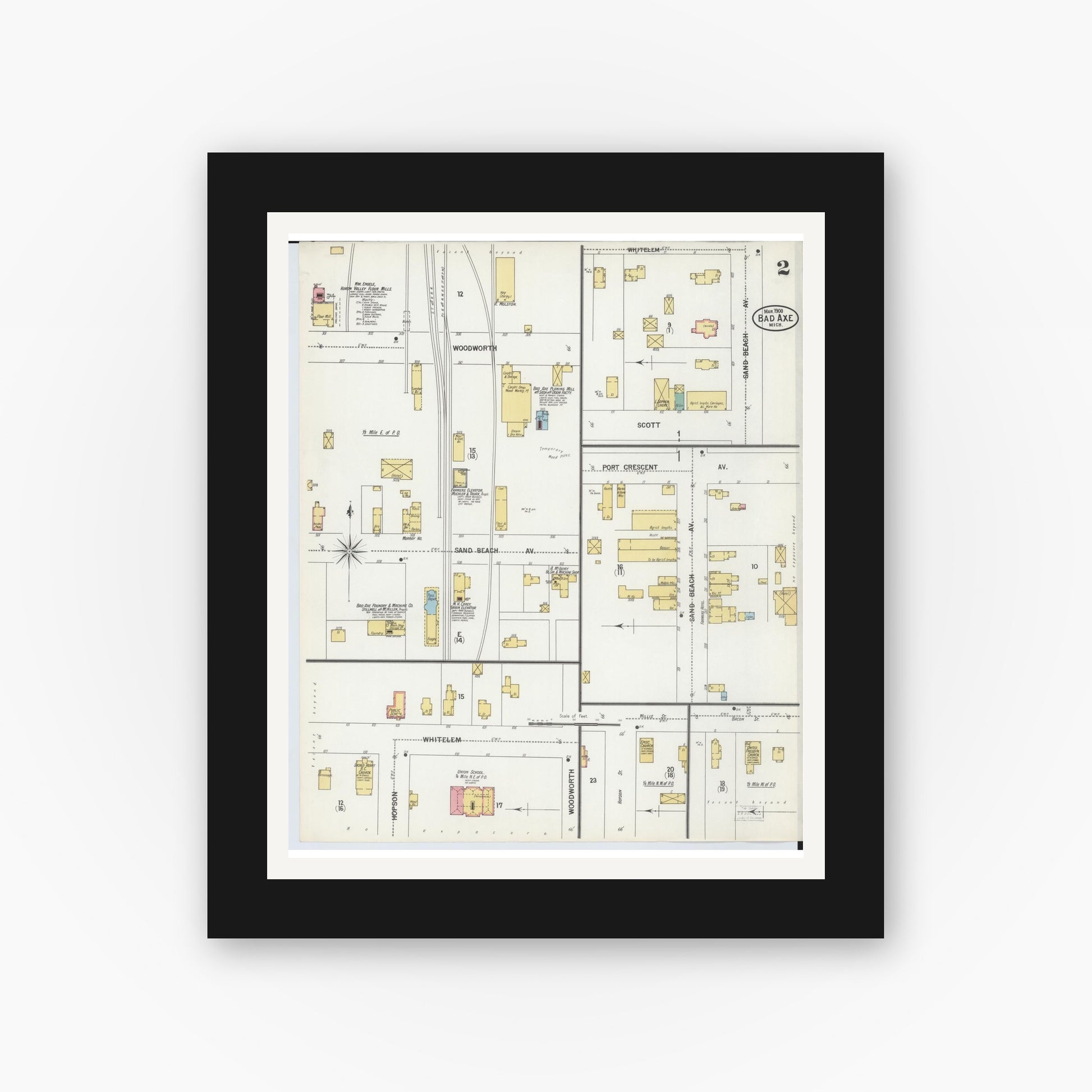 Old map wall art mockup — black gallery frame with white mat — Sanborn Fire Insurance Map from Bad Axe, Huron County, Michigan (1900), Sheet #0002