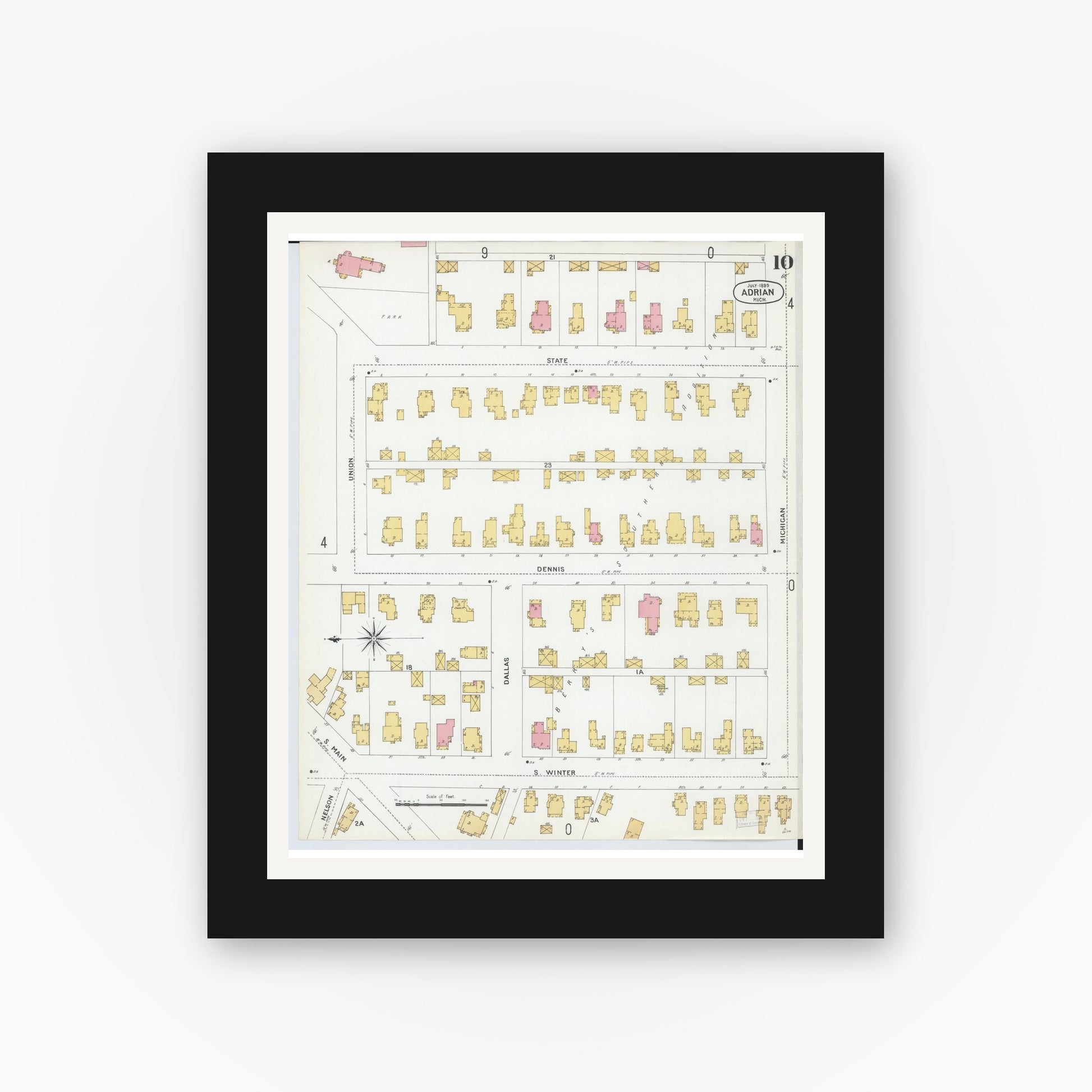 Old map wall art mockup — black gallery frame with white mat — Sanborn Fire Insurance Map from Adrian, Lenawee County, Michigan (1899), Sheet #0010