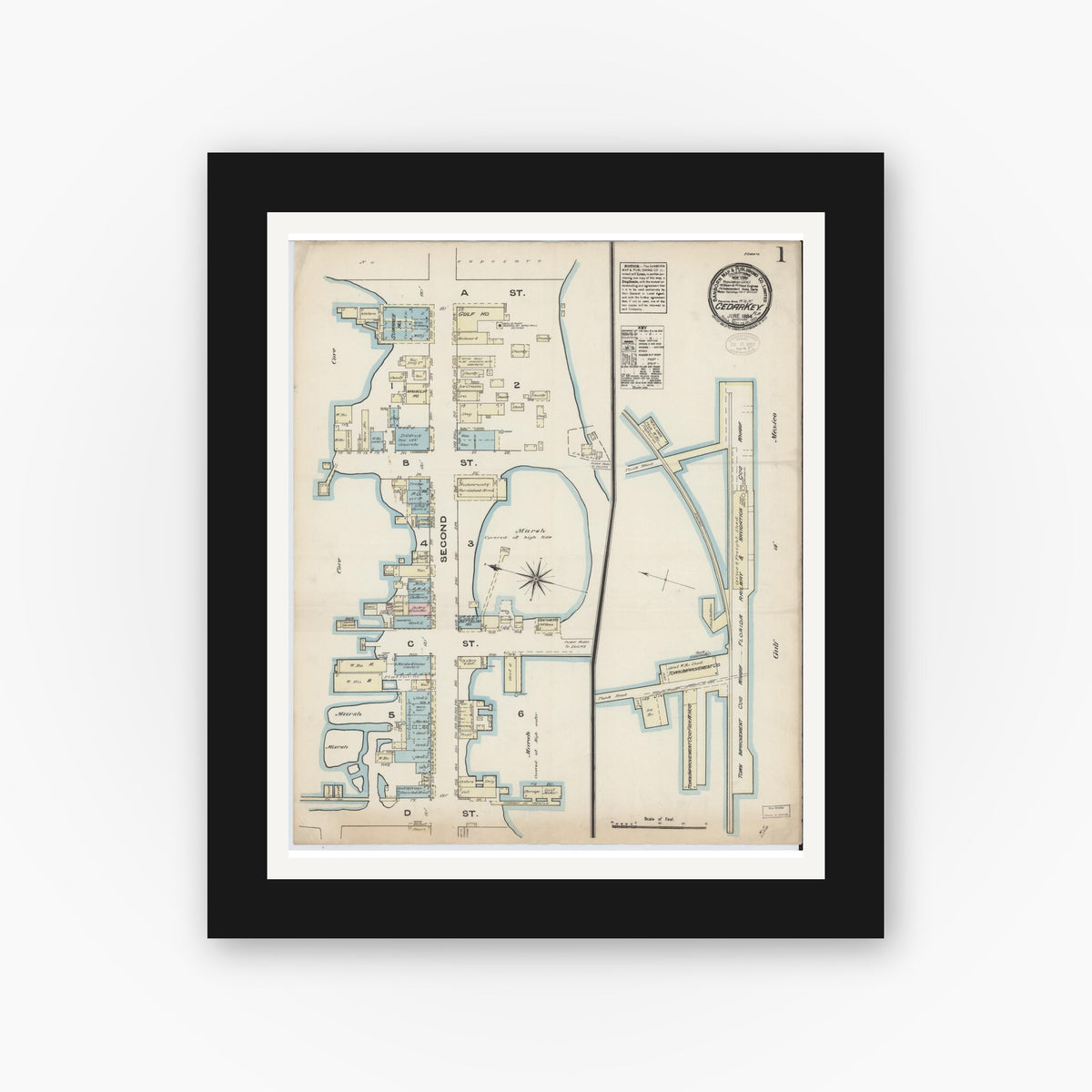 Old map wall art mockup — black gallery frame with white mat — Sanborn Fire Insurance Map from Cedar Key, Levy County, Florida (1884), Sheet #0001