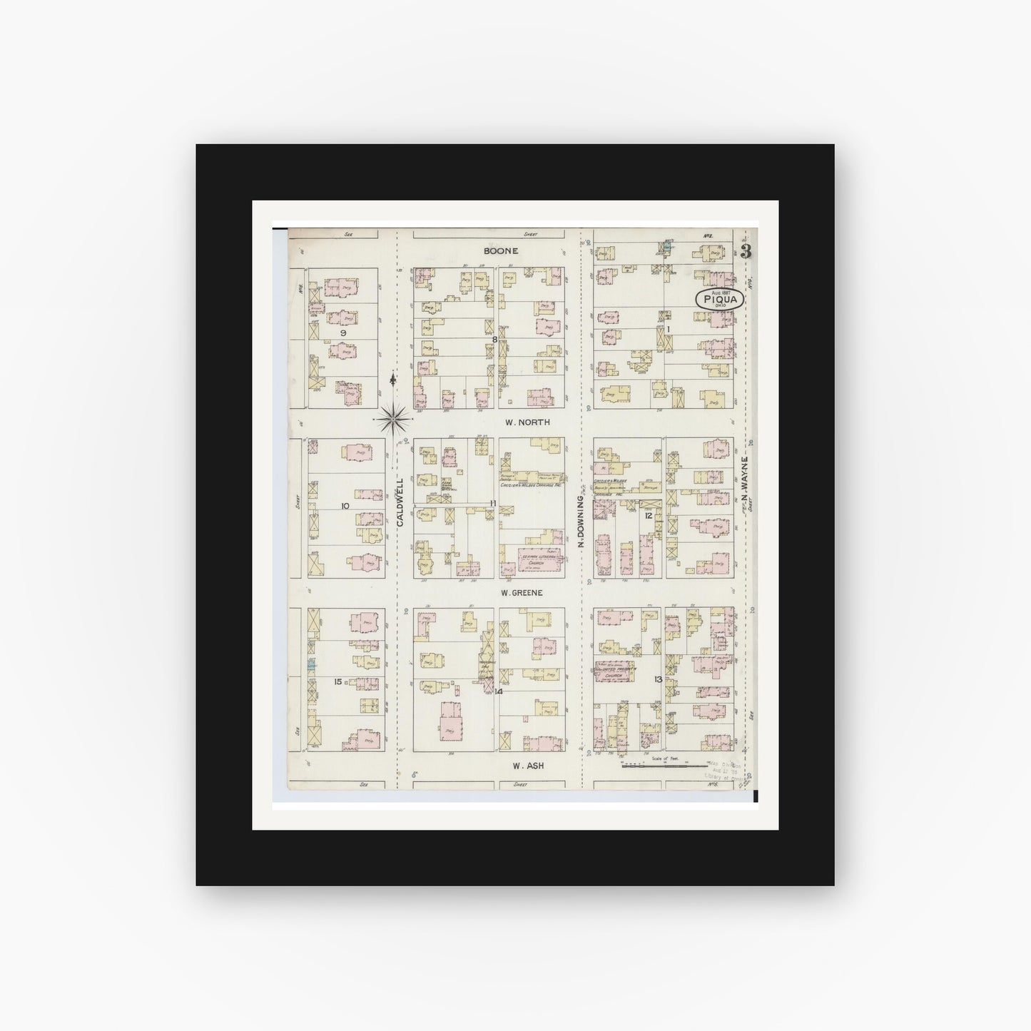 Old map wall art mockup — black gallery frame with white mat — Sanborn Fire Insurance Map from Piqua, Miami County, Ohio (1887), Sheet #0003
