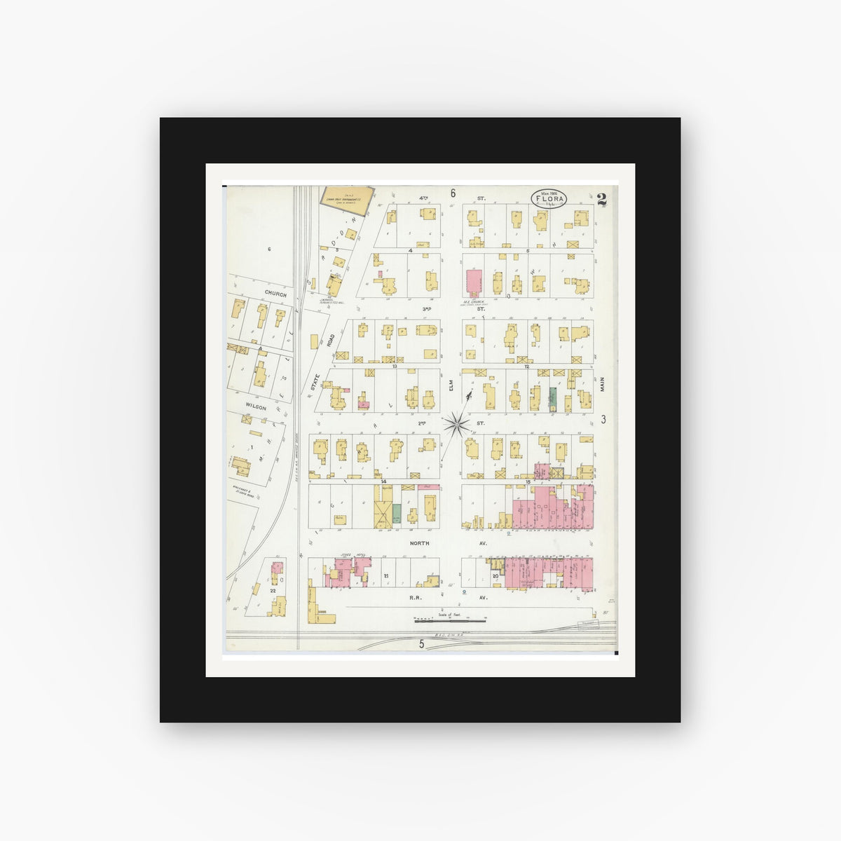 Old map wall art mockup — black gallery frame with white mat — Sanborn Fire Insurance Map from Flora, Clay County, Illinois (1906), Sheet #0002