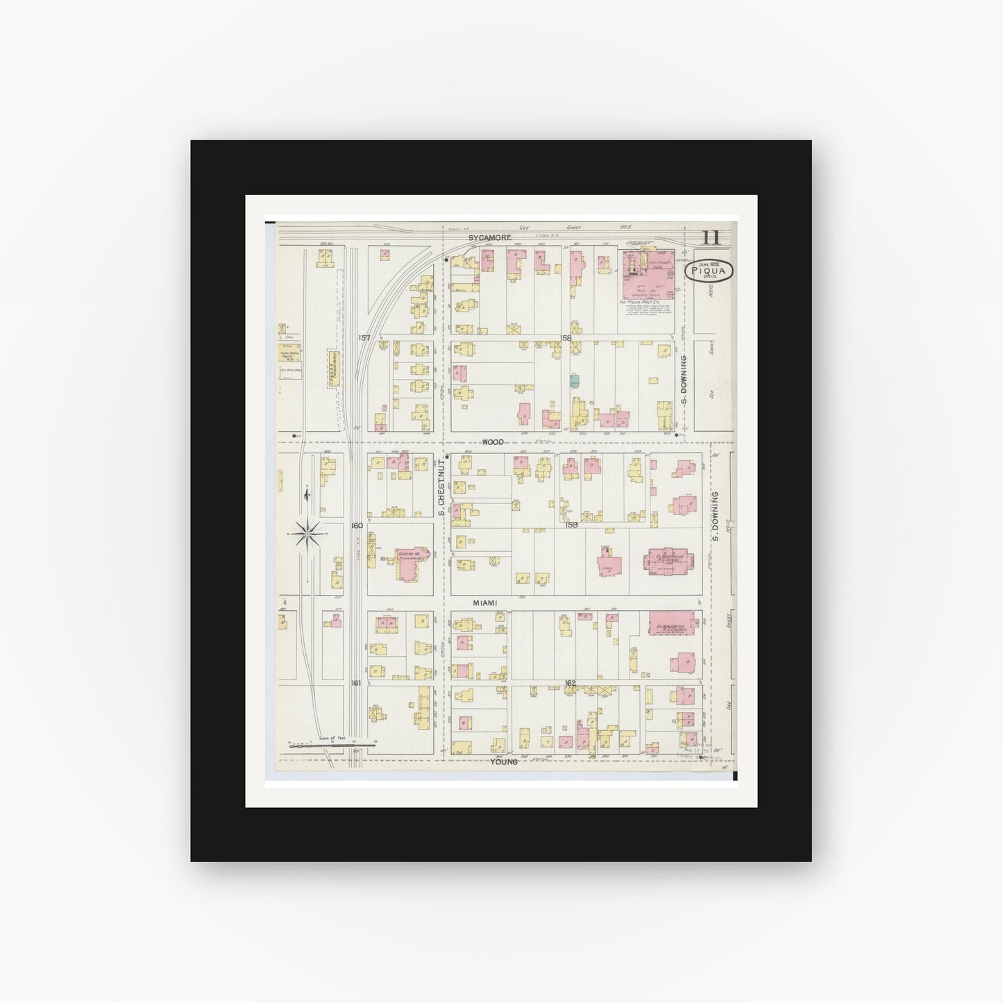 Old map wall art mockup — black gallery frame with white mat — Sanborn Fire Insurance Map from Piqua, Miami County, Ohio (1892), Sheet #0011