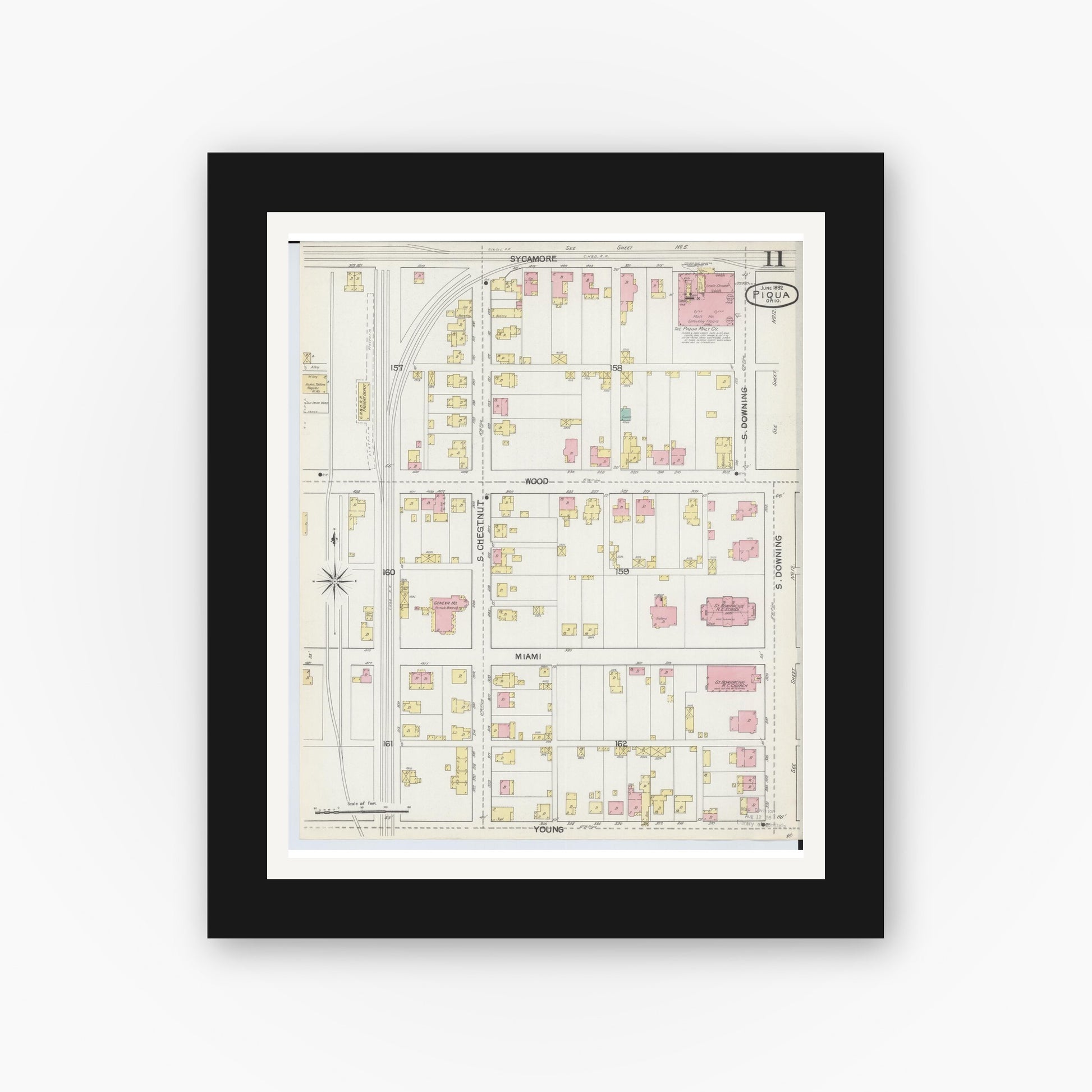 Old map wall art mockup — black gallery frame with white mat — Sanborn Fire Insurance Map from Piqua, Miami County, Ohio (1892), Sheet #0011