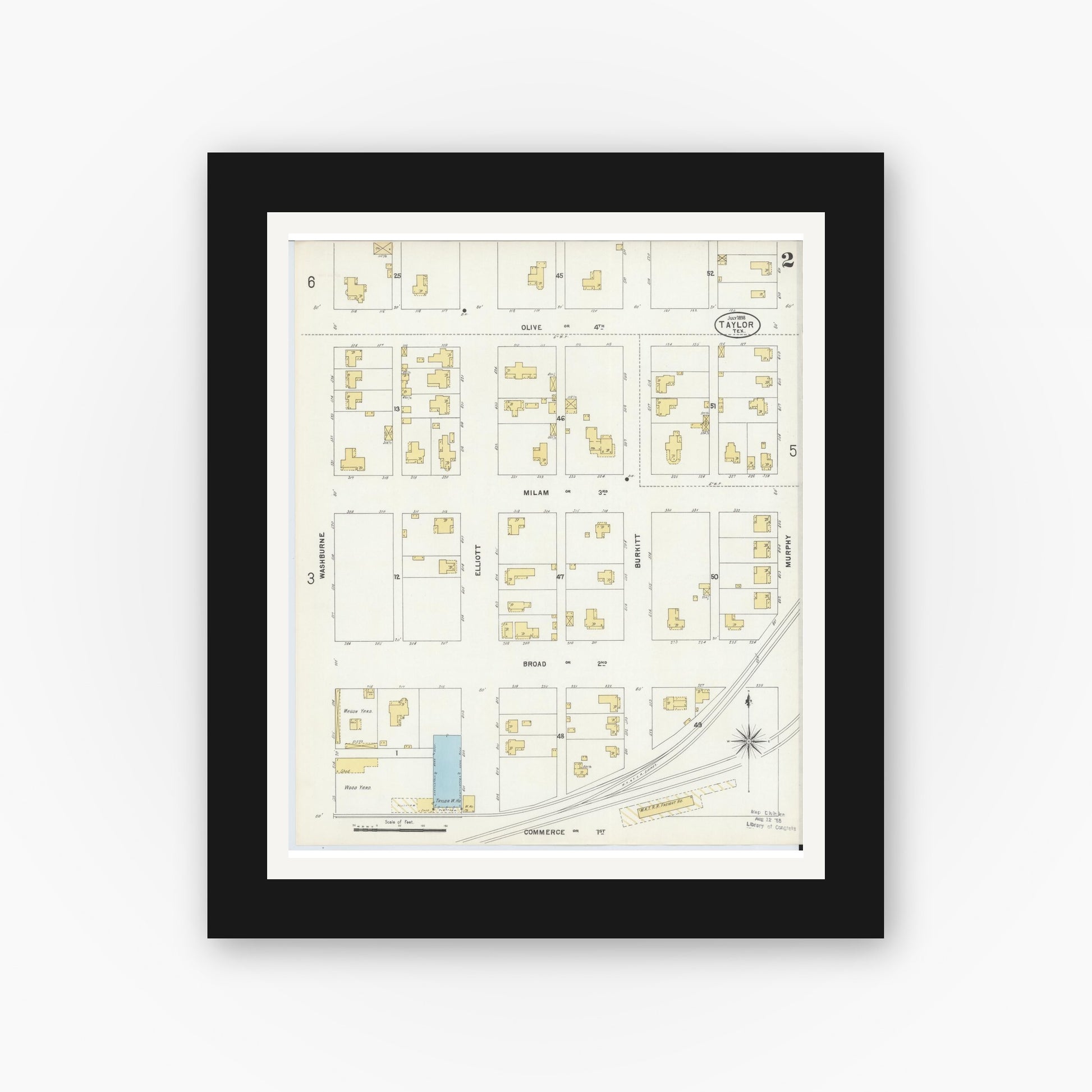 Old map wall art mockup — black gallery frame with white mat — Sanborn Fire Insurance Map from Taylor, Williamson County, Texas (1898), Sheet #0002