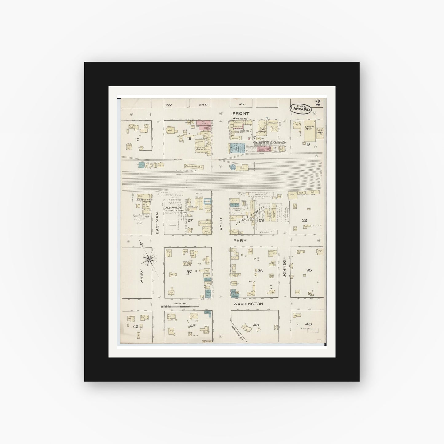 Old map wall art mockup — black gallery frame with white mat — Sanborn Fire Insurance Map from Harvard, McHenry County, Illinois (1885), Sheet #0002