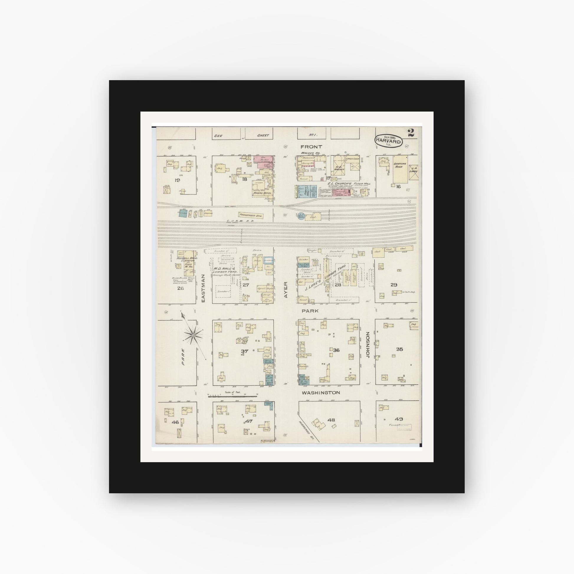 Old map wall art mockup — black gallery frame with white mat — Sanborn Fire Insurance Map from Harvard, McHenry County, Illinois (1885), Sheet #0002