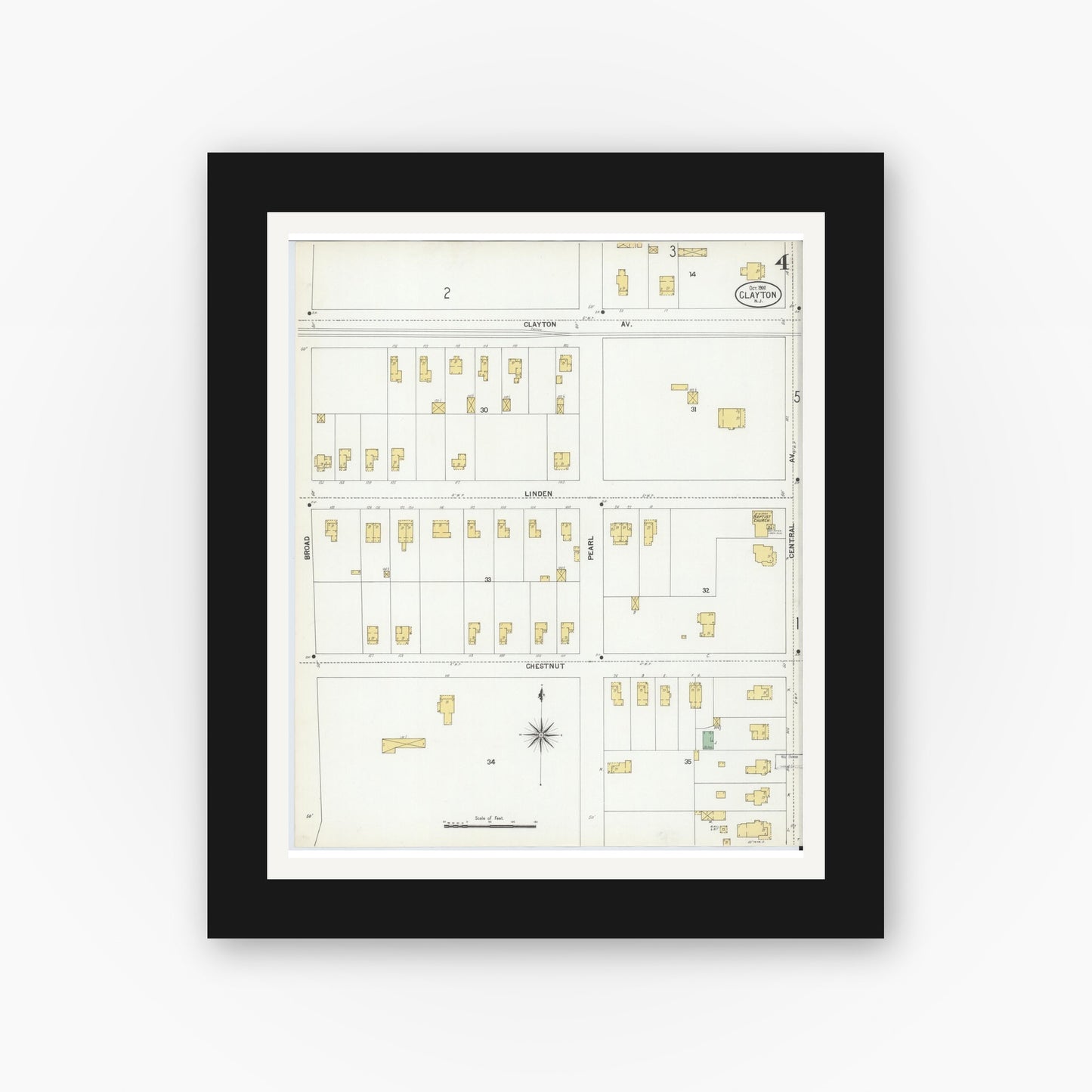 Old map wall art mockup — black gallery frame with white mat — Sanborn Fire Insurance Map from Clayton, Gloucester County, New Jersey (1900), Sheet #0004