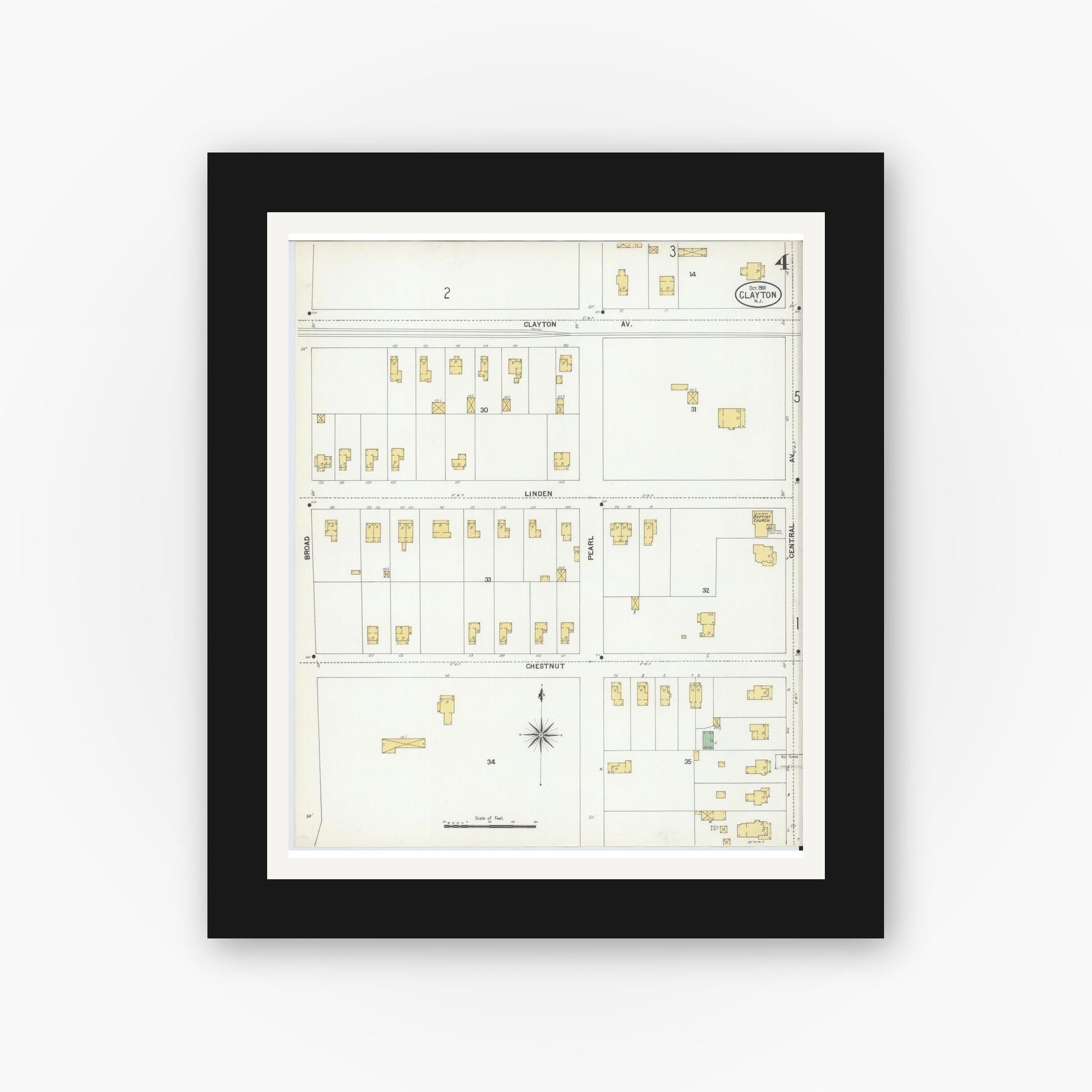 Old map wall art mockup — black gallery frame with white mat — Sanborn Fire Insurance Map from Clayton, Gloucester County, New Jersey (1900), Sheet #0004