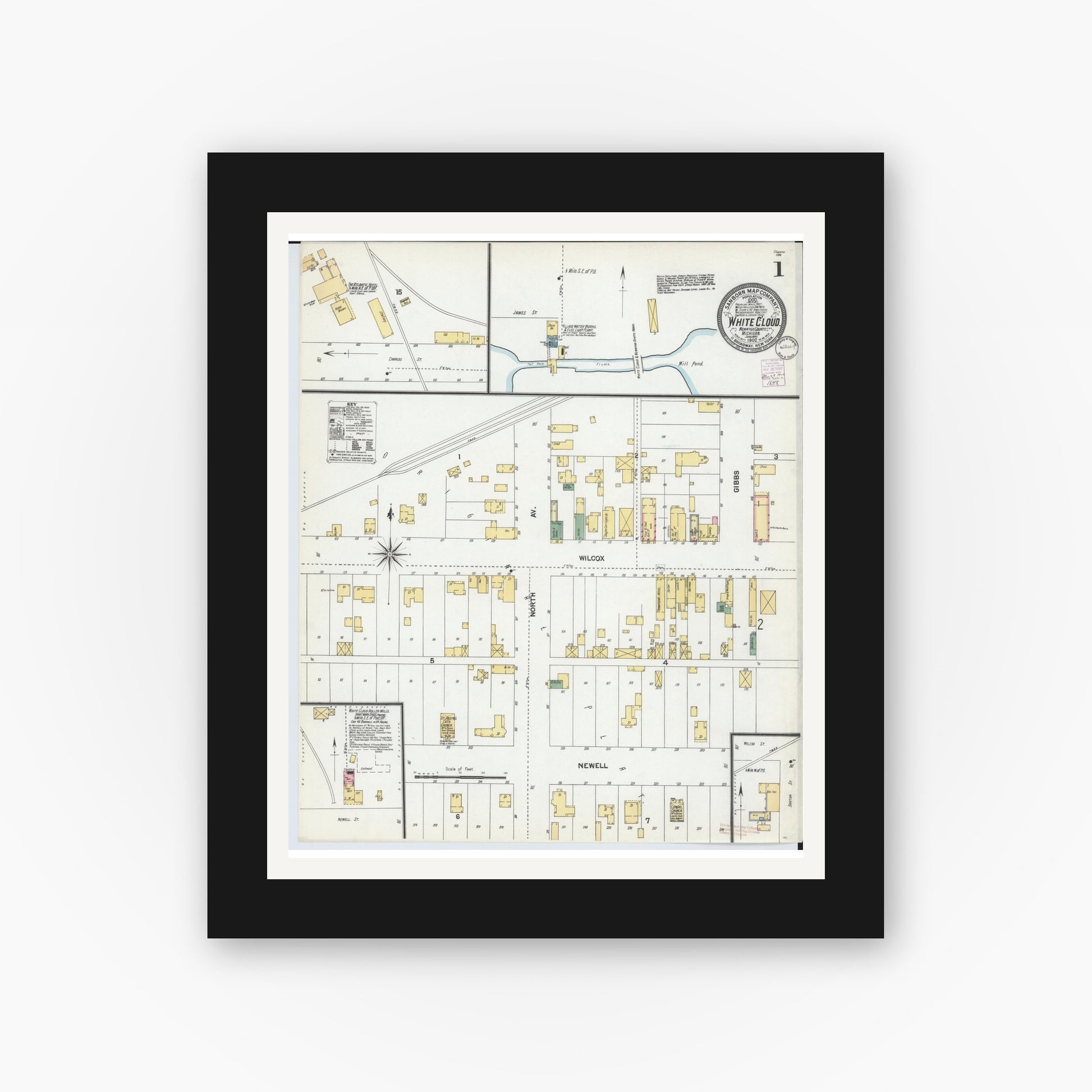 Old map wall art mockup — black gallery frame with white mat — Sanborn Fire Insurance Map from White Cloud, Newaygo County, Michigan (1902), Sheet #0001