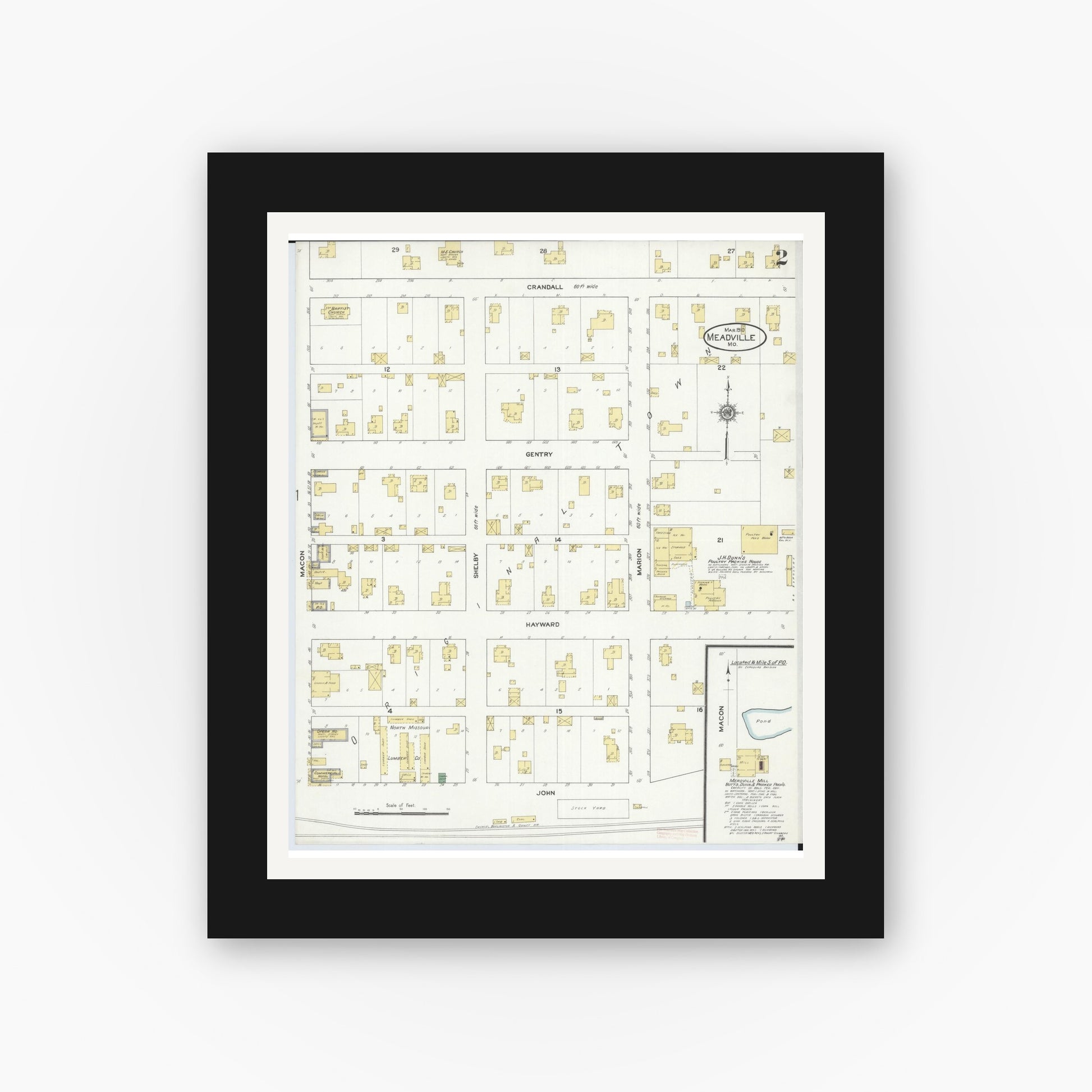 Old map wall art mockup — black gallery frame with white mat — Sanborn Fire Insurance Map from Meadville, Linn County, Missouri (1910), Sheet #0002