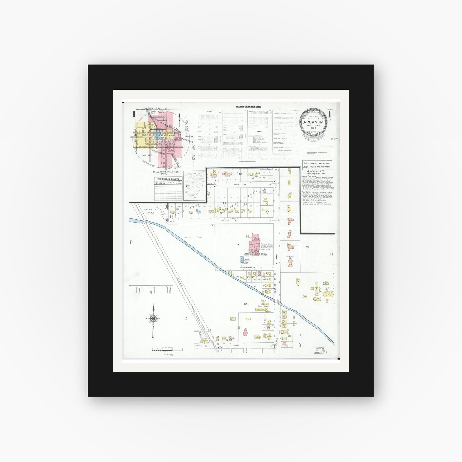 Old map wall art mockup — black gallery frame with white mat — Sanborn Fire Insurance Map from Arcanum, Darke County, Ohio (1951), Sheet #0001