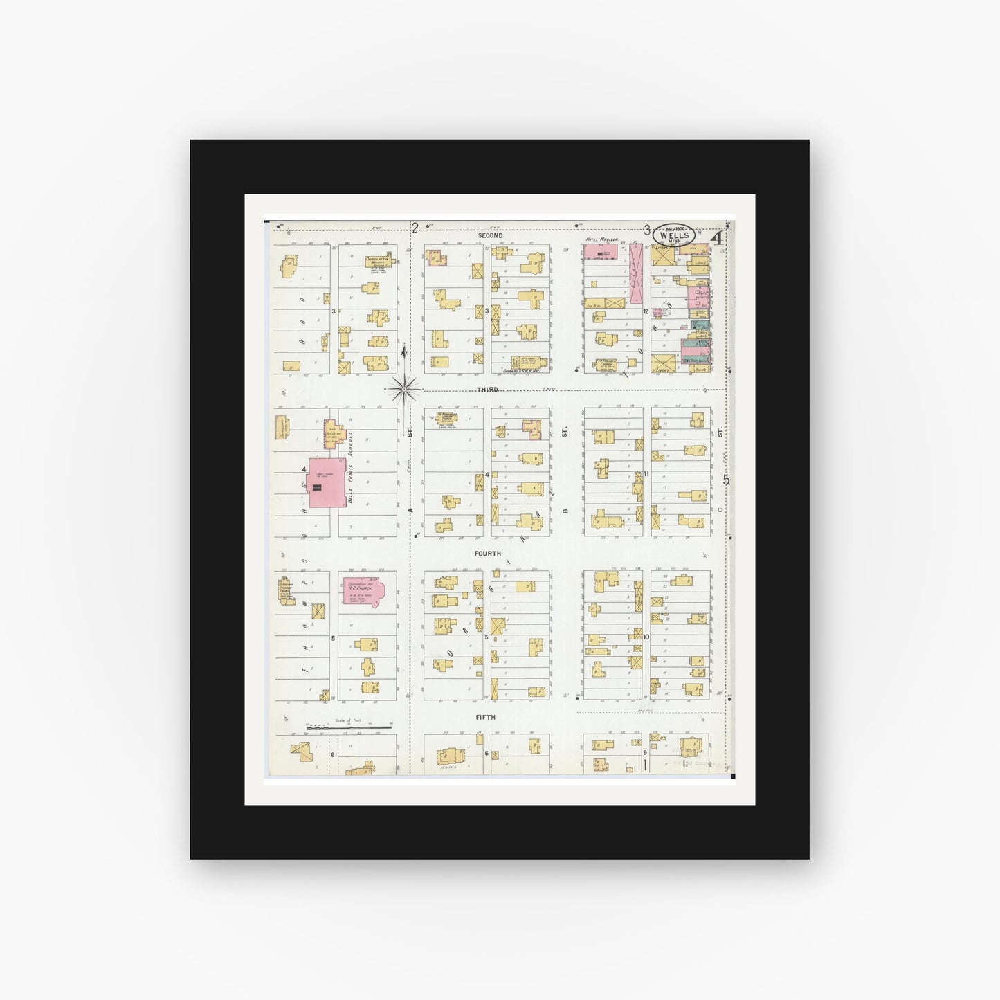 Old map wall art mockup — black gallery frame with white mat — Sanborn Fire Insurance Map from Wells, Faribault County, Minnesota (1900), Sheet #0004