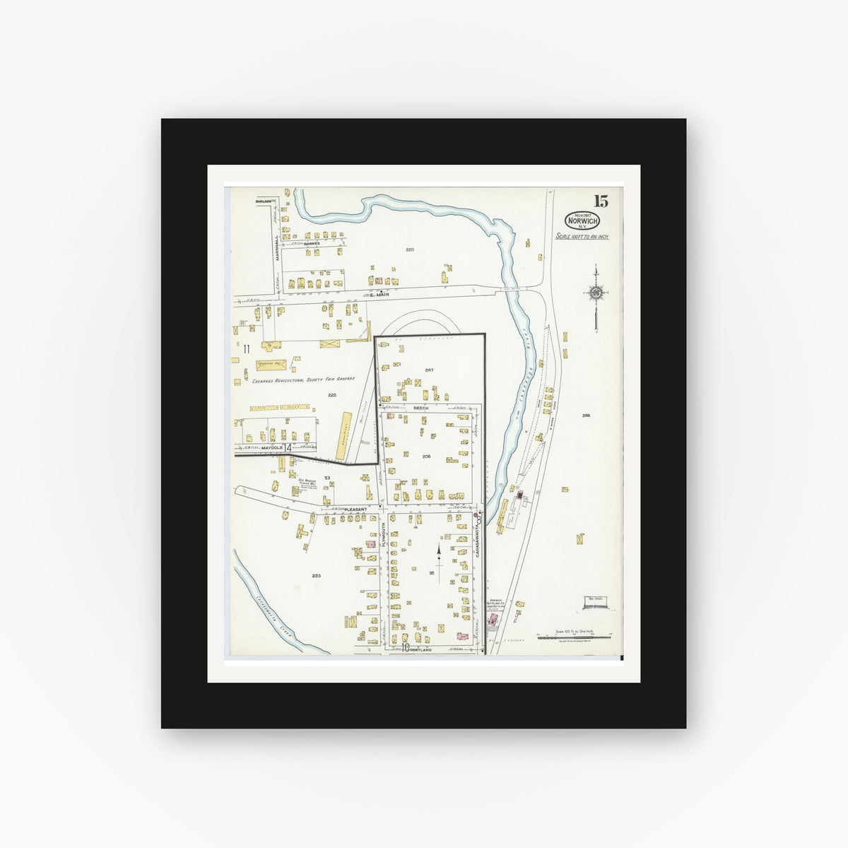 Old map wall art mockup — black gallery frame with white mat — Sanborn Fire Insurance Map from Norwich, Chenango County, New York (1917), Sheet #0015