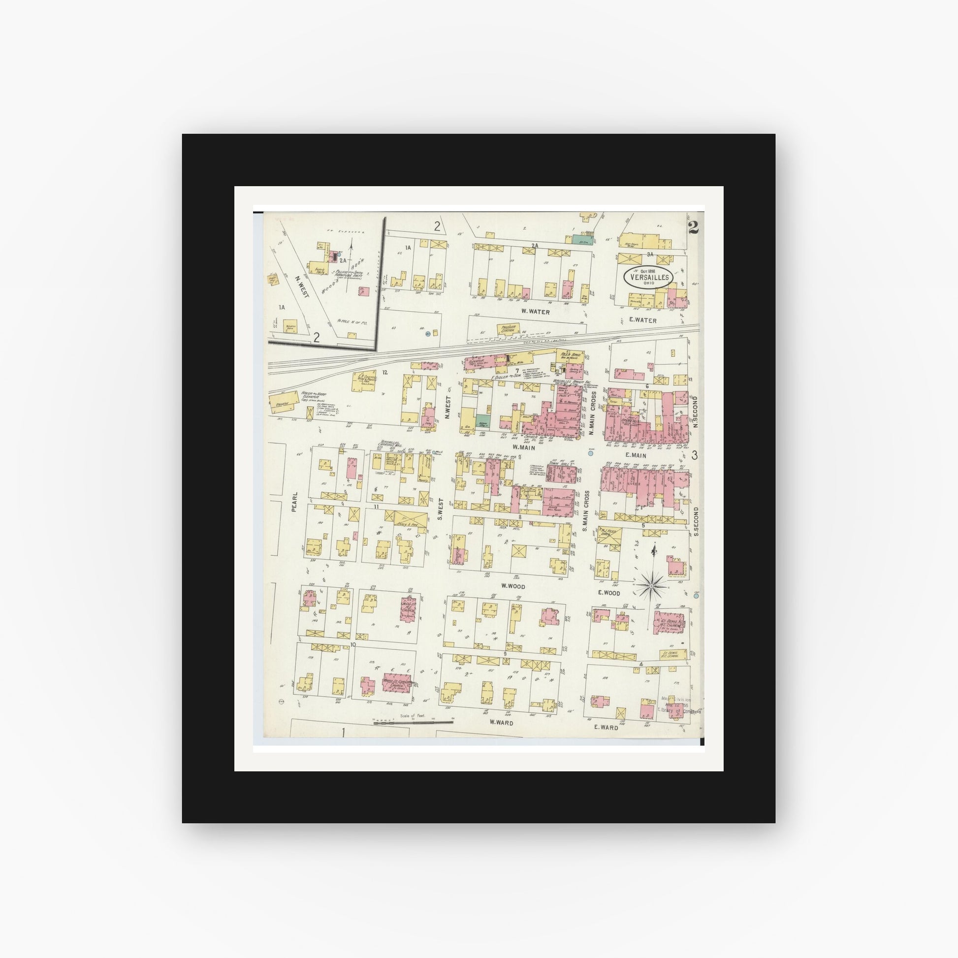 Old map wall art mockup — black gallery frame with white mat — Sanborn Fire Insurance Map from Versailles, Darke County, Ohio (1898), Sheet #0002