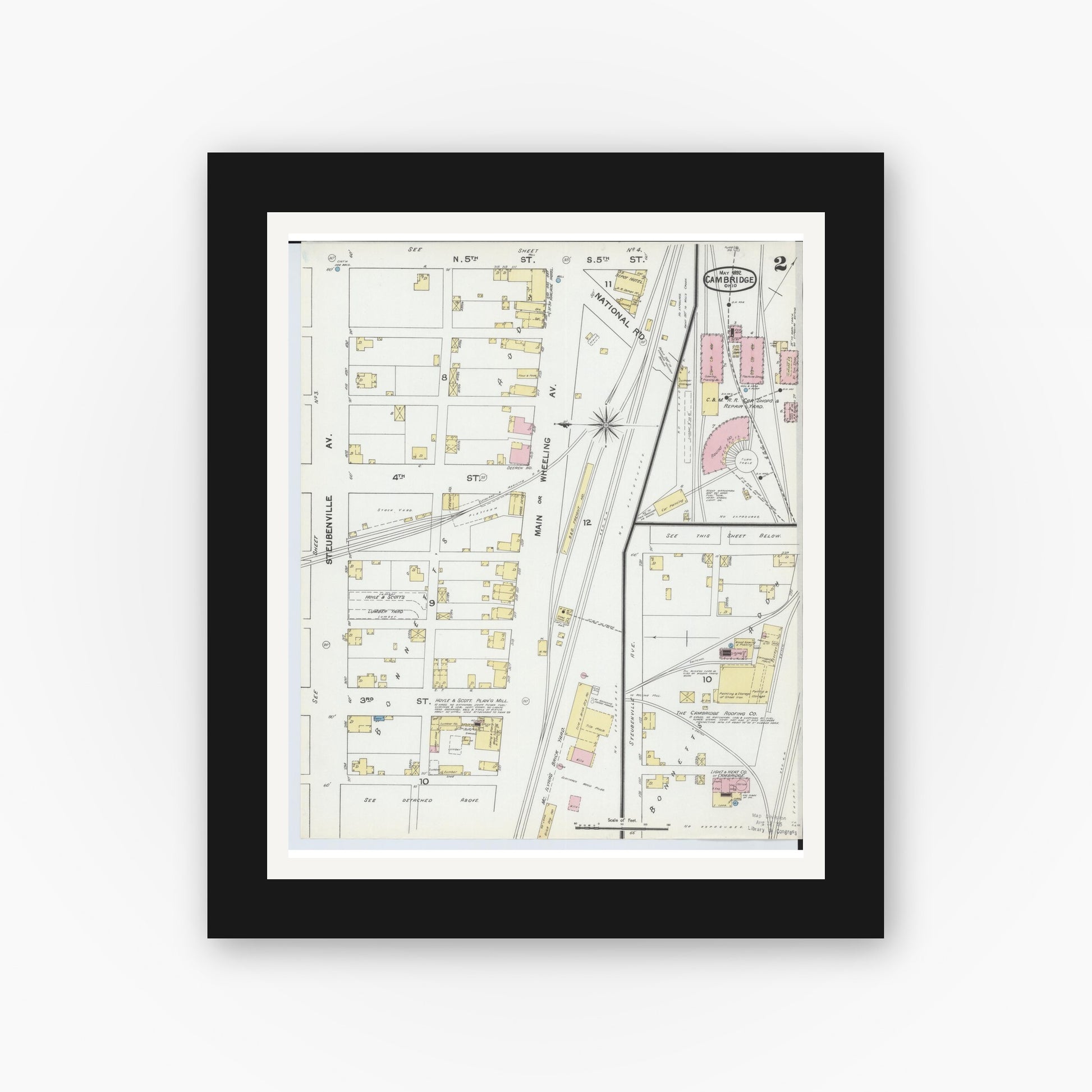 Old map wall art mockup — black gallery frame with white mat — Sanborn Fire Insurance Map from Cambridge, Guernsey County, Ohio (1892), Sheet #0002