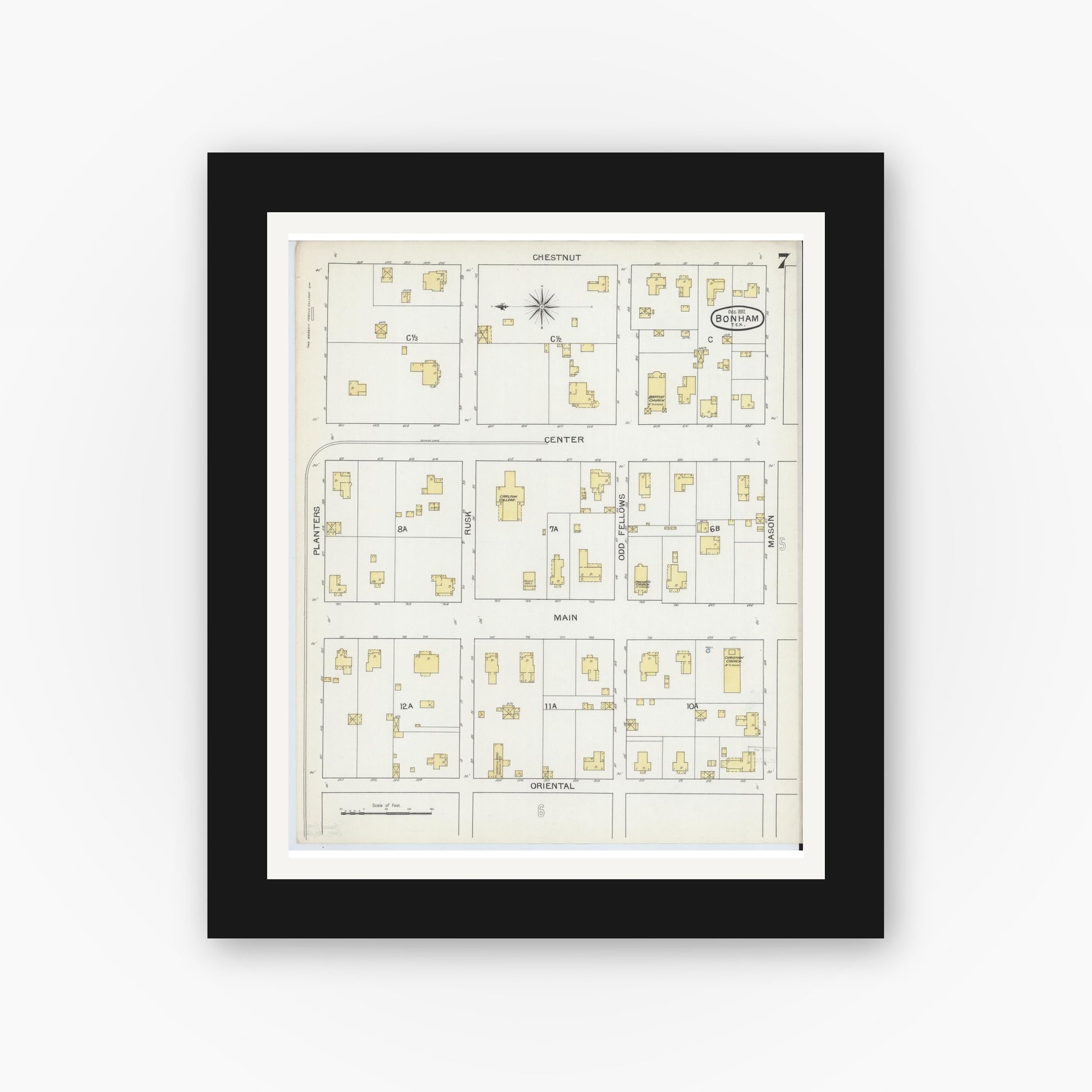Old map wall art mockup — black gallery frame with white mat — Sanborn Fire Insurance Map from Bonham, Fannin County, Texas (1892), Sheet #0007