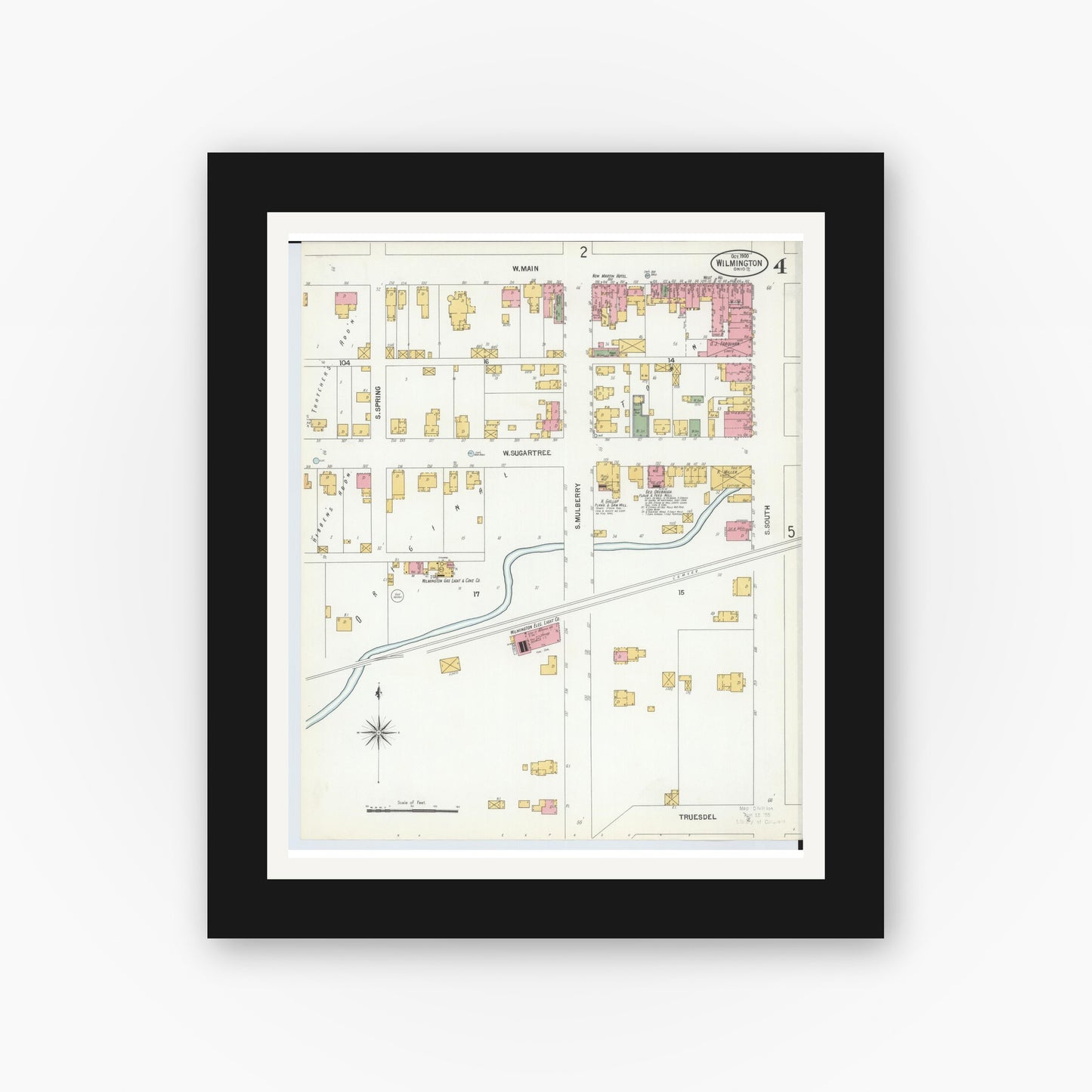 Old map wall art mockup — black gallery frame with white mat — Sanborn Fire Insurance Map from Wilmington, Clinton County, Ohio (1900), Sheet #0004