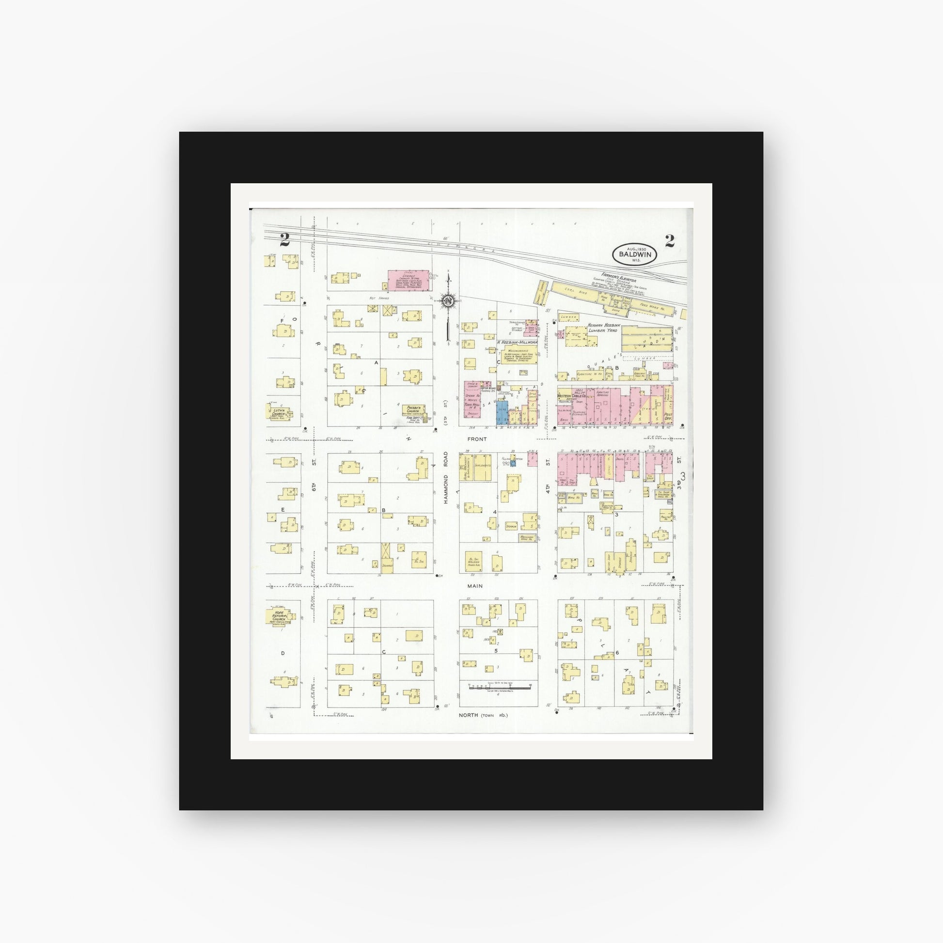 Old map wall art mockup — black gallery frame with white mat — Sanborn Fire Insurance Map from Baldwin, St. Croix County, Wisconsin (1930), Sheet #0002