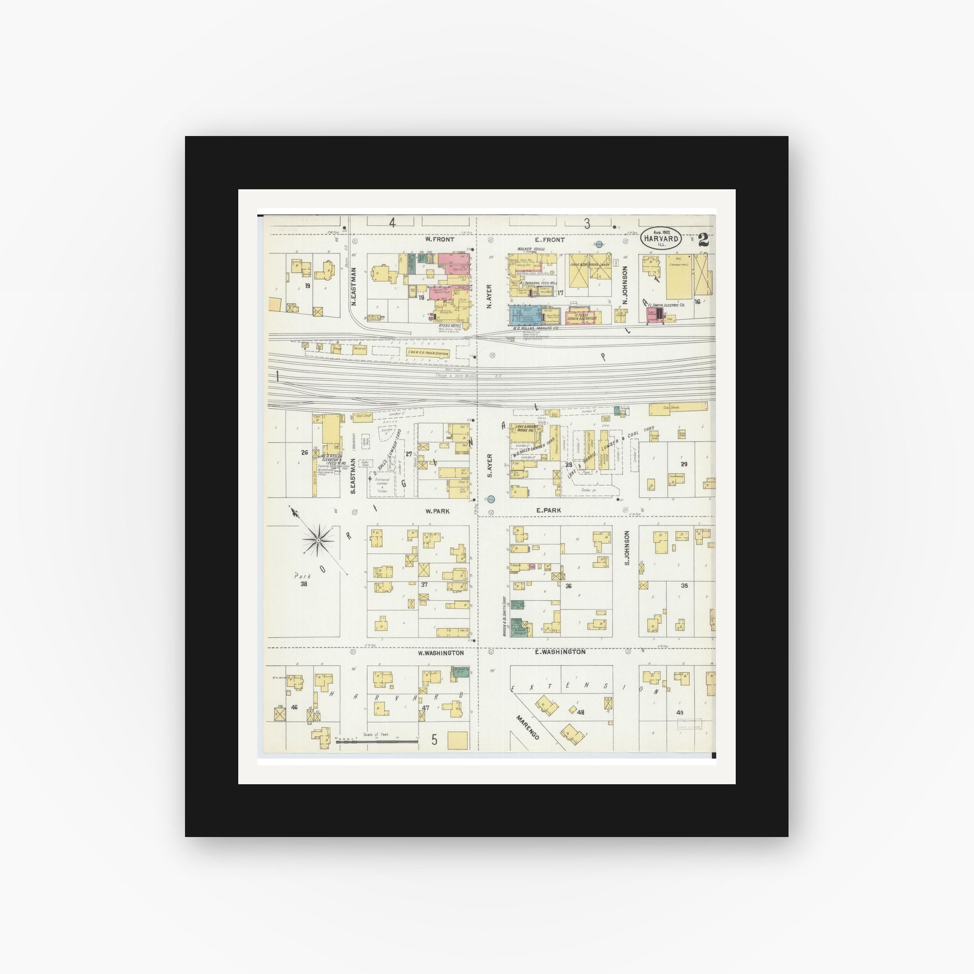 Old map wall art mockup — black gallery frame with white mat — Sanborn Fire Insurance Map from Harvard, McHenry County, Illinois (1902), Sheet #0002