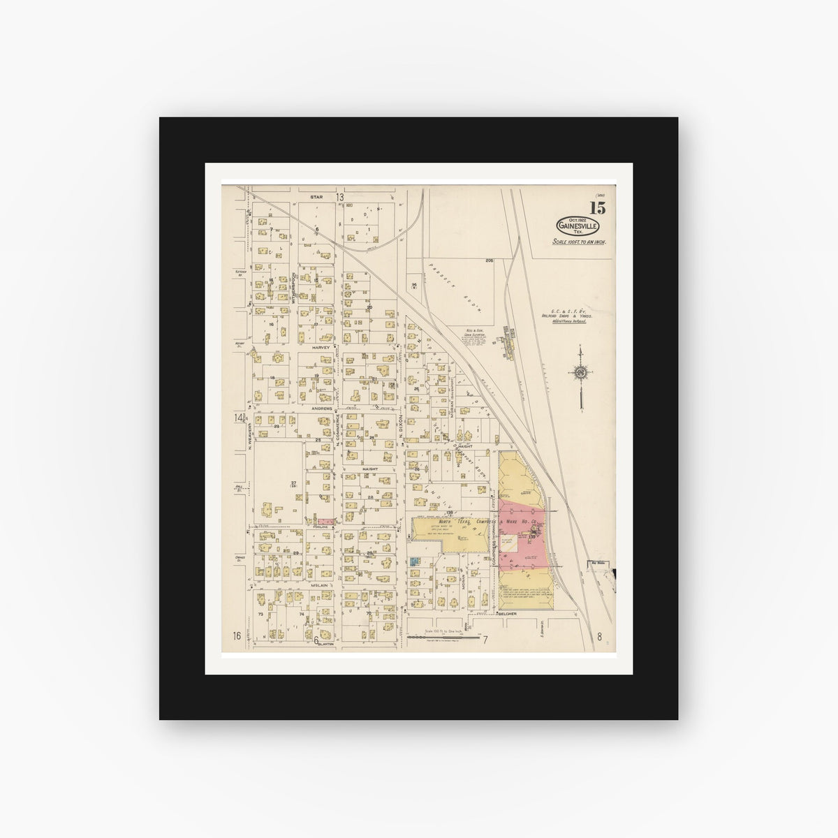 Old map wall art mockup — black gallery frame with white mat — Sanborn Fire Insurance Map from Gainesville, Cooke County, Texas (1922), Sheet #0015