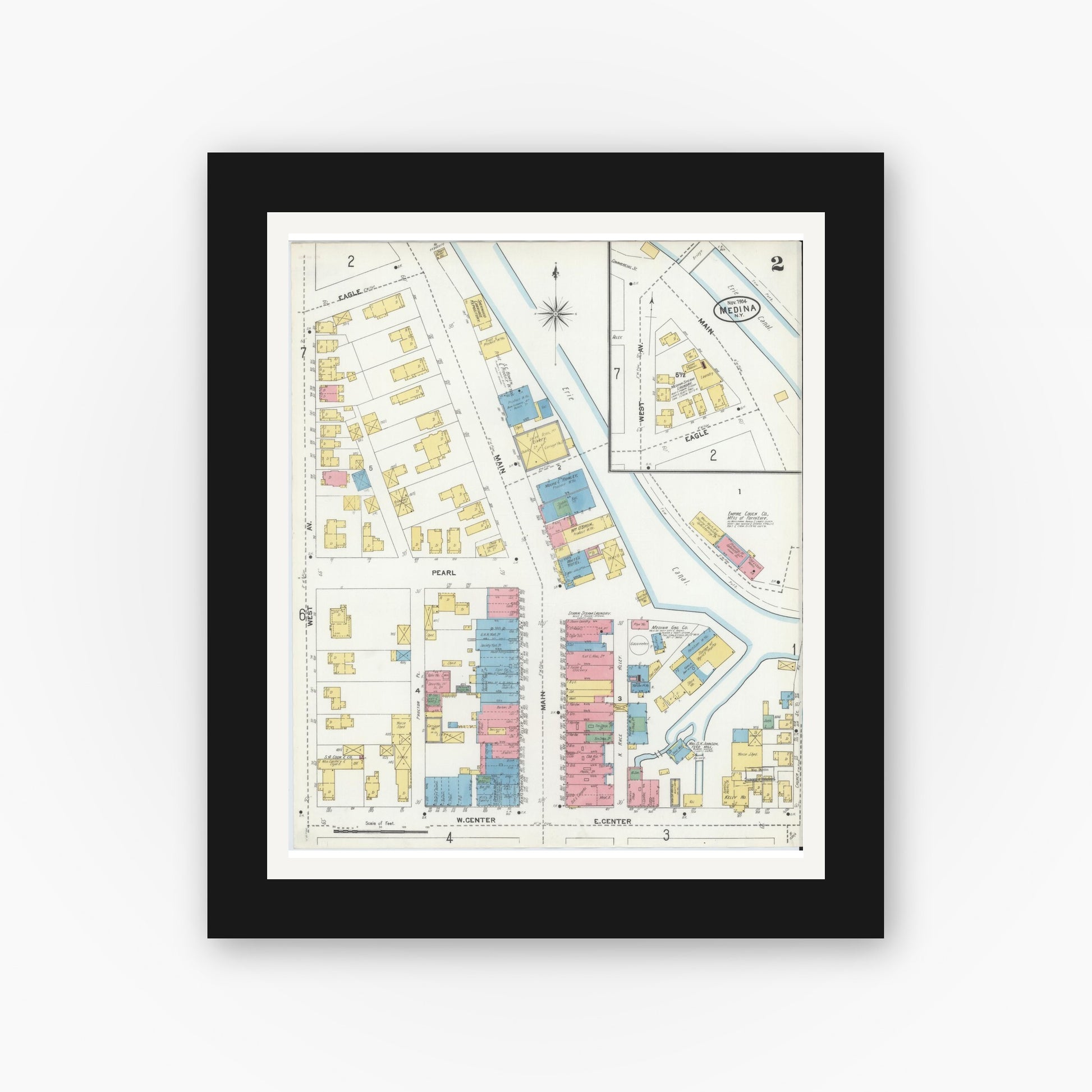 Old map wall art mockup — black gallery frame with white mat — Sanborn Fire Insurance Map from Medina, Orleans County, New York (1904), Sheet #0002