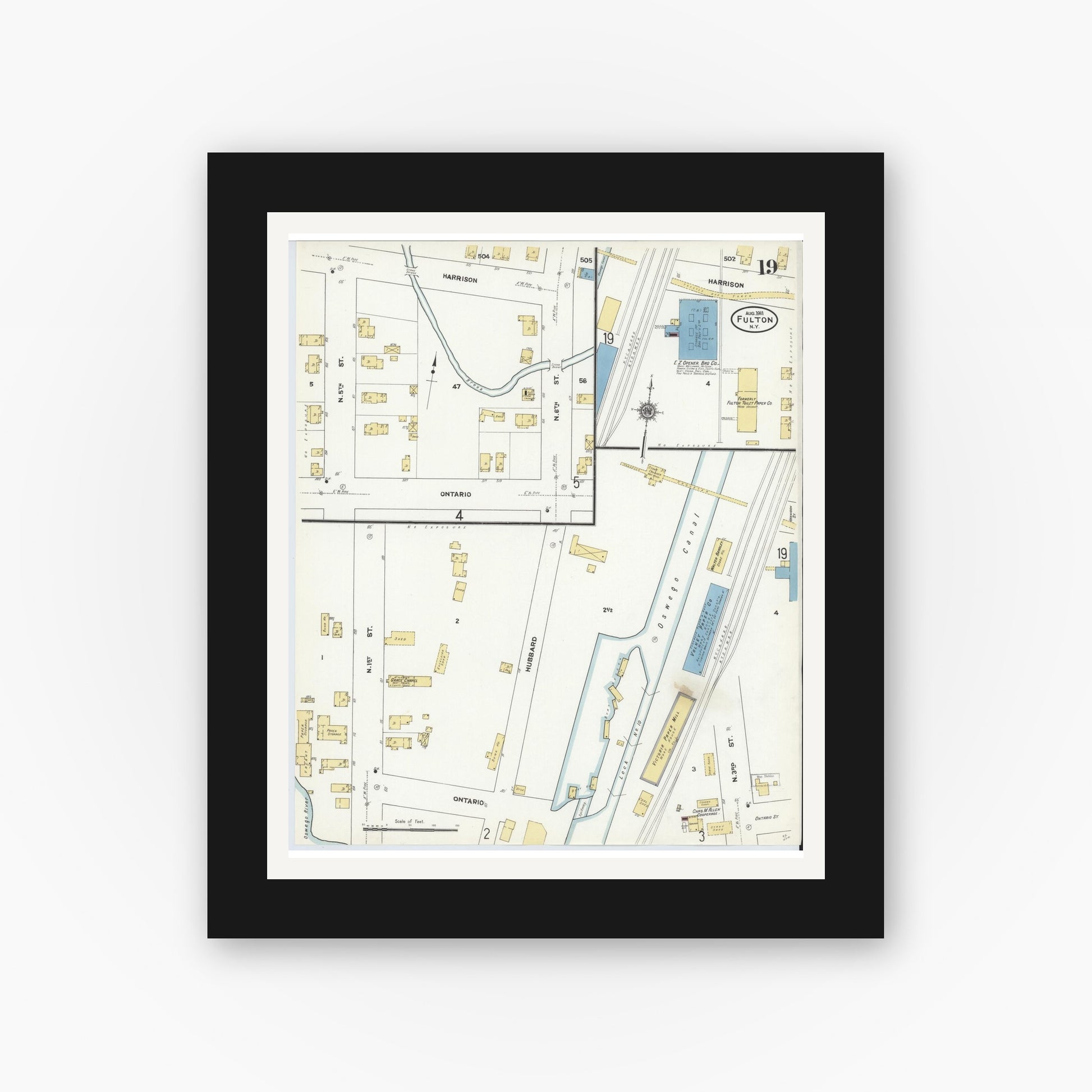 Old map wall art mockup — black gallery frame with white mat — Sanborn Fire Insurance Map from Fulton, Oswego County, New York (1911), Sheet #0019