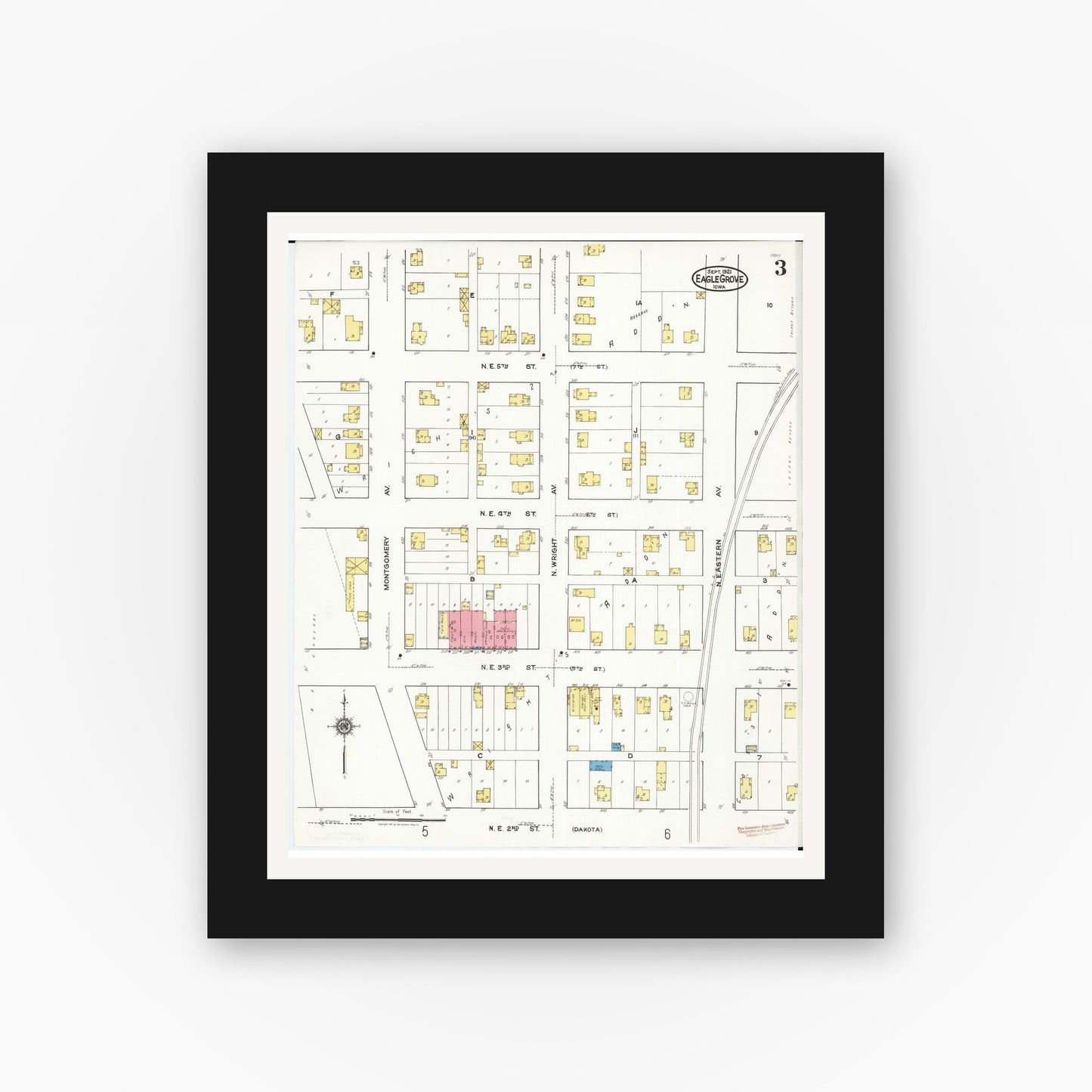 Old map wall art mockup — black gallery frame with white mat — Sanborn Fire Insurance Map from Eagle Grove, Wright County, Iowa (1921), Sheet #0003