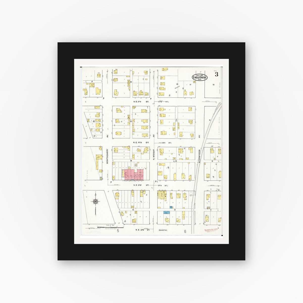 Old map wall art mockup — black gallery frame with white mat — Sanborn Fire Insurance Map from Eagle Grove, Wright County, Iowa (1921), Sheet #0003