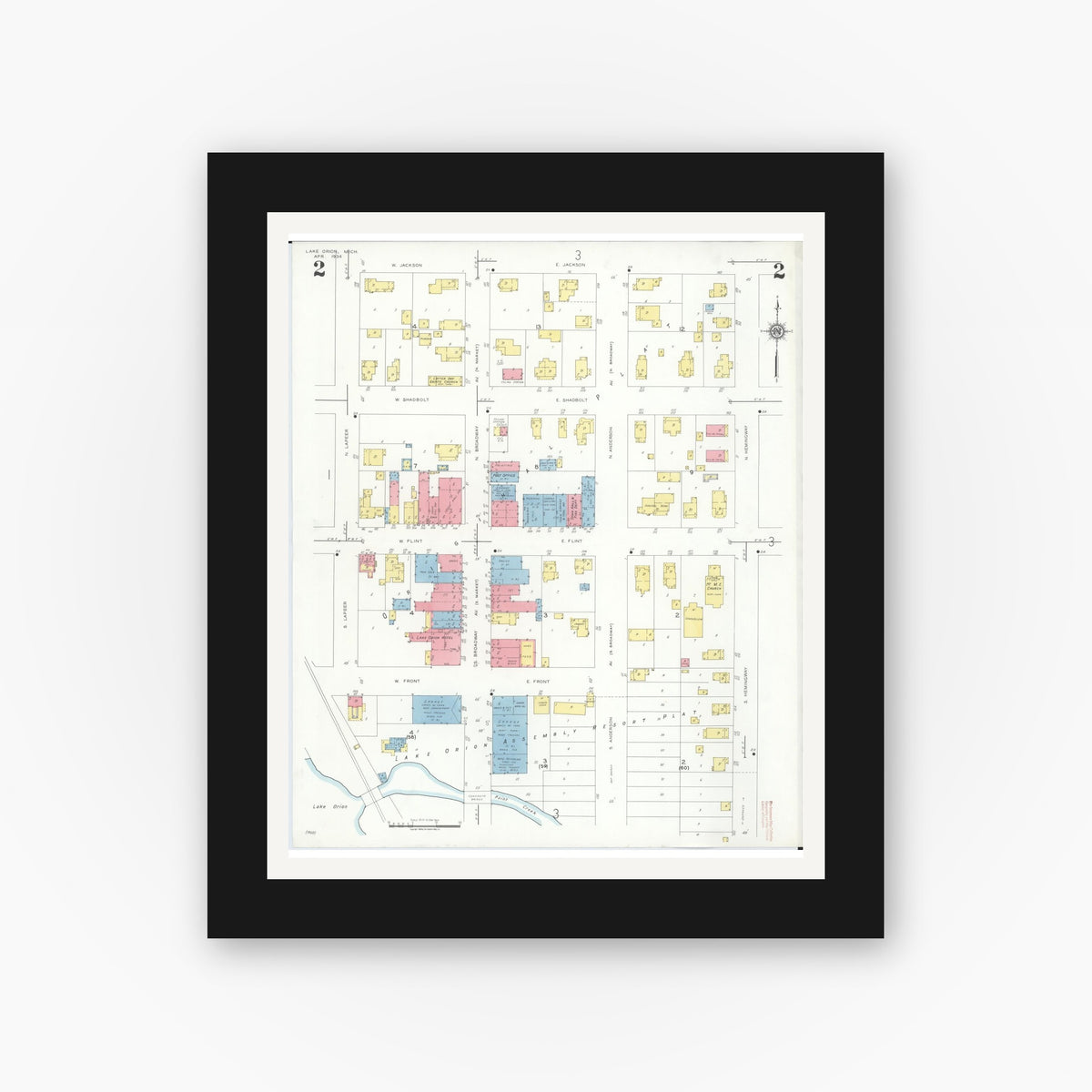 Old map wall art mockup — black gallery frame with white mat — Sanborn Fire Insurance Map from Lake Orion, Oakland County, Michigan (1934), Sheet #0002
