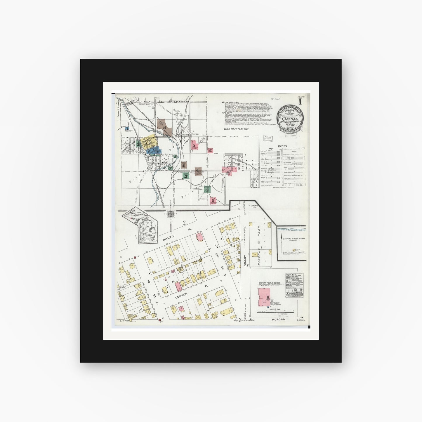 Old map wall art mockup — black gallery frame with white mat — Sanborn Fire Insurance Map from Caspian, Iron County, Michigan (1922) - Complete Map Set