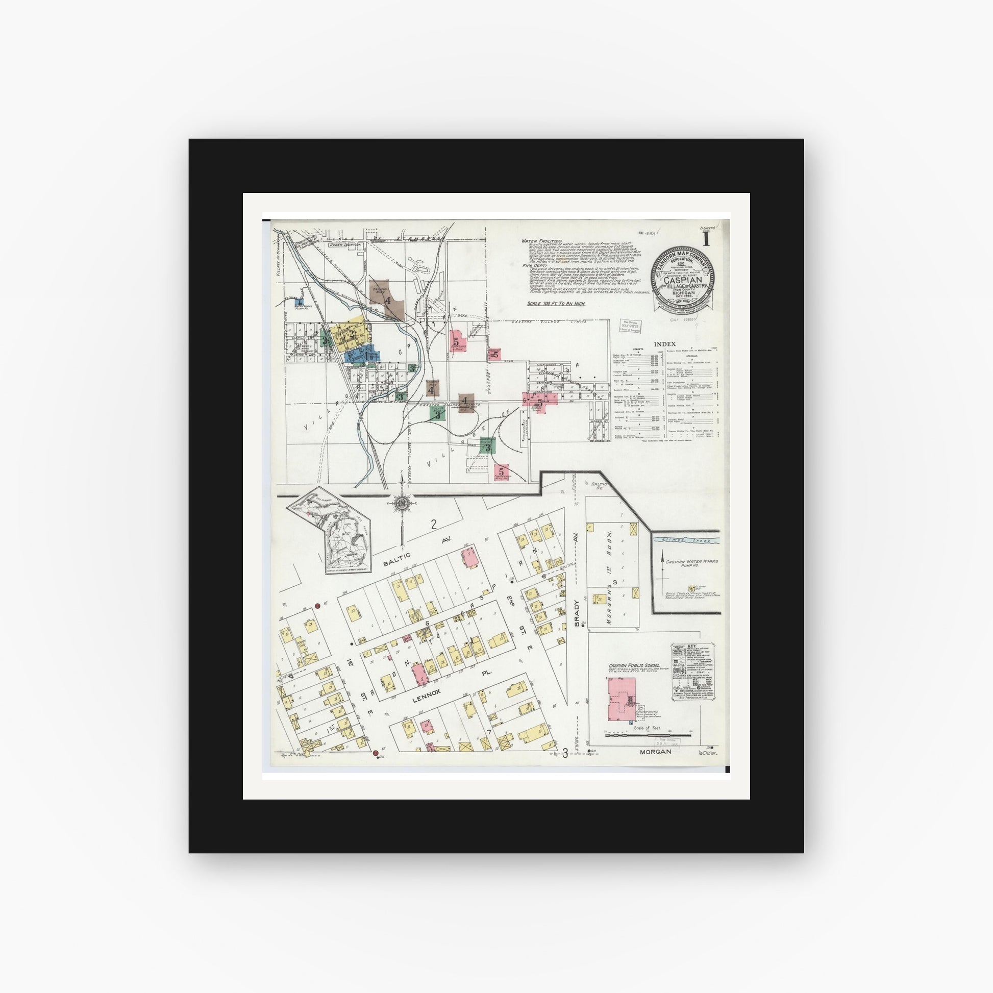 Old map wall art mockup — black gallery frame with white mat — Sanborn Fire Insurance Map from Caspian, Iron County, Michigan (1922) - Complete Map Set