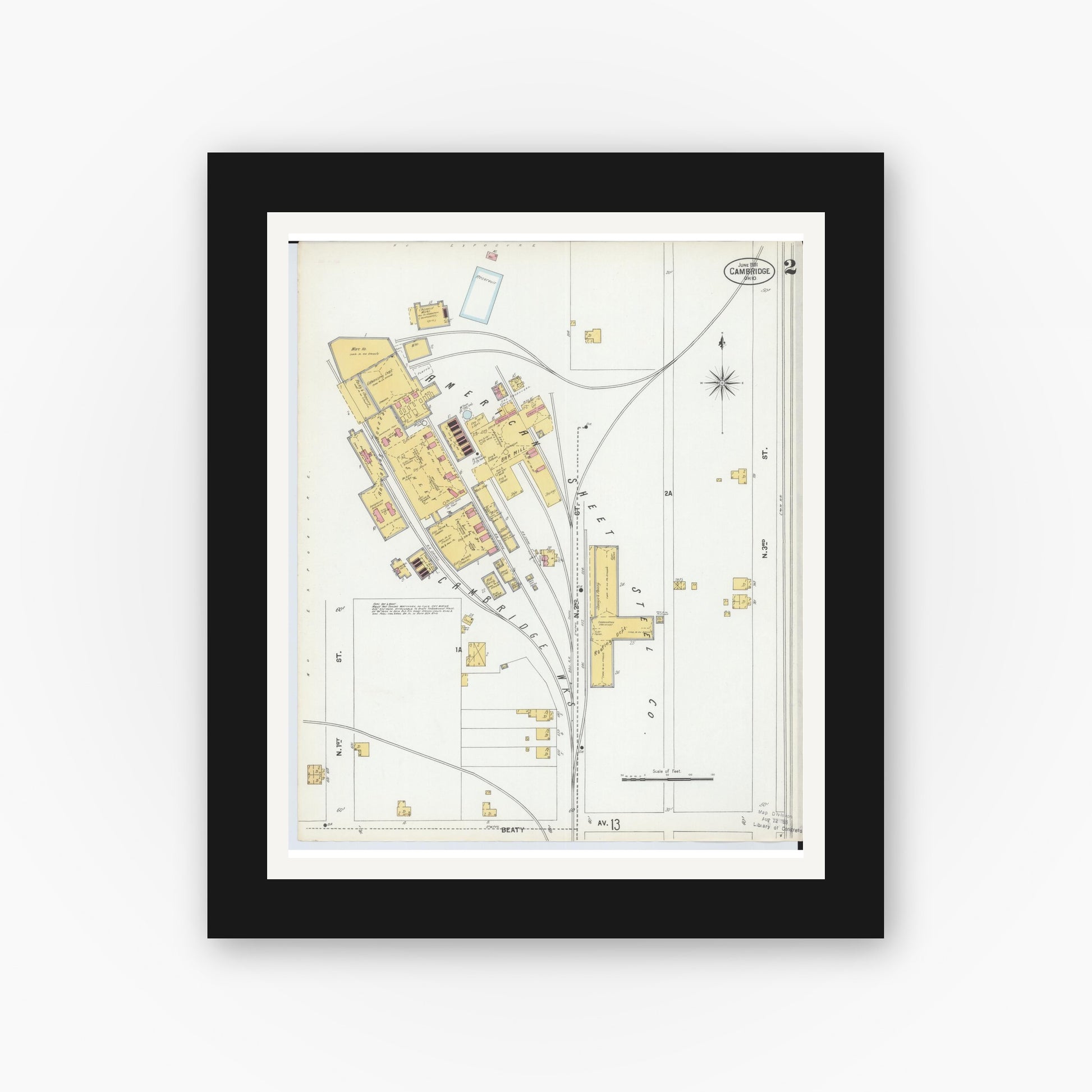 Old map wall art mockup — black gallery frame with white mat — Sanborn Fire Insurance Map from Cambridge, Guernsey County, Ohio (1901), Sheet #0002