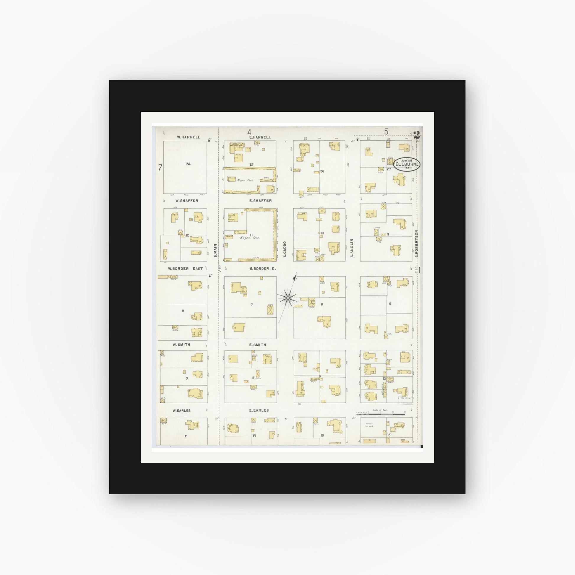 Old map wall art mockup — black gallery frame with white mat — Sanborn Fire Insurance Map from Cleburne, Johnson County, Texas (1898), Sheet #0002