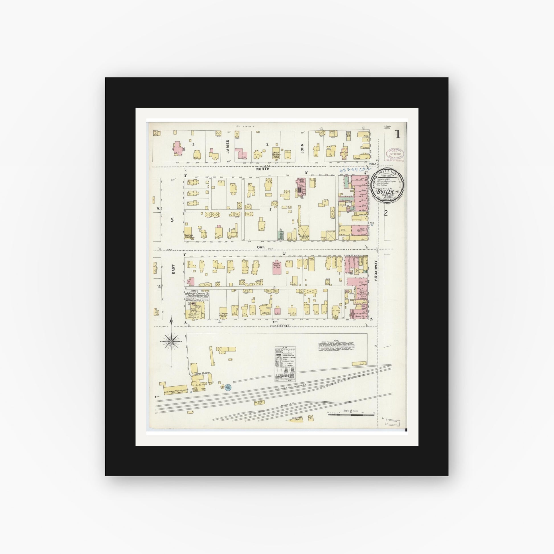 Old map wall art mockup — black gallery frame with white mat — Sanborn Fire Insurance Map from Butler, De Kalb County, Indiana (1897) - Complete Map Set