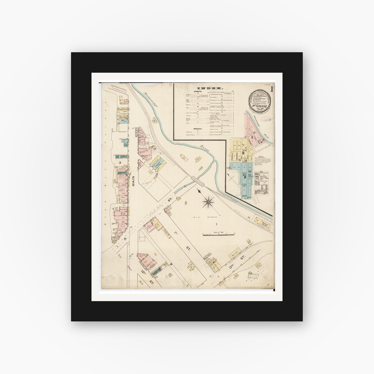 Old map wall art mockup — black gallery frame with white mat — Sanborn Fire Insurance Map from McGregor, Clayton County, Iowa (1886), Sheet #0001