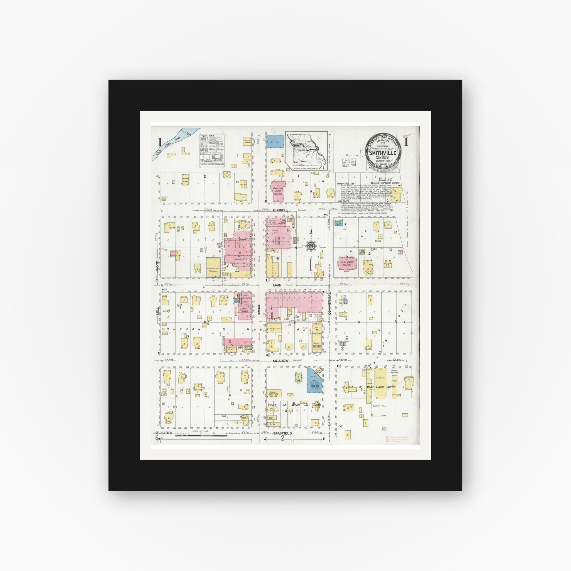 Old map wall art mockup — black gallery frame with white mat — Sanborn Fire Insurance Map from Smithville, Clay County, Missouri (1928), Sheet #0001