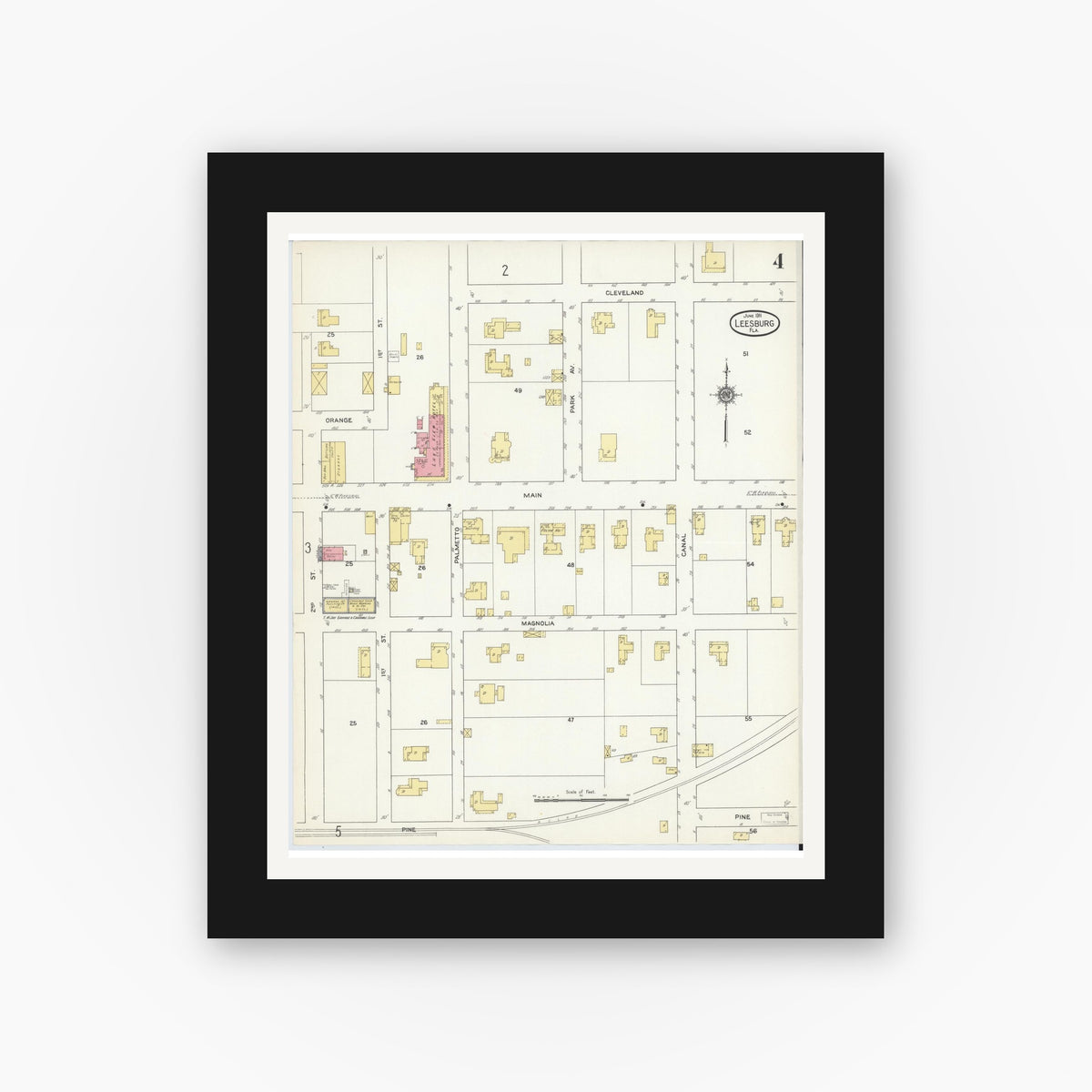 Old map wall art mockup — black gallery frame with white mat — Sanborn Fire Insurance Map from Leesburg, Lake County, Florida (1911), Sheet #0004